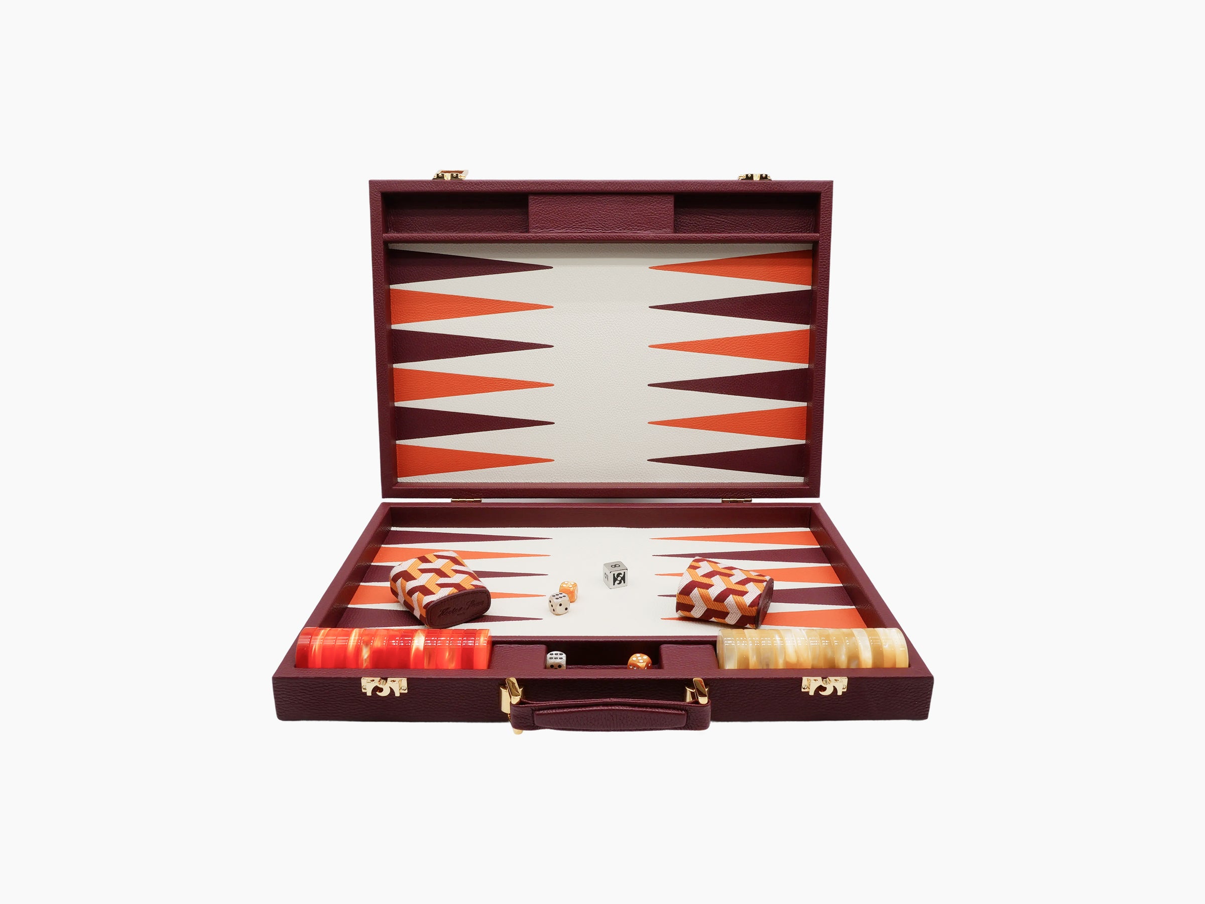 Open burgundy leather backgammon case with orange and burgundy triangular points and visible dice and leather cups