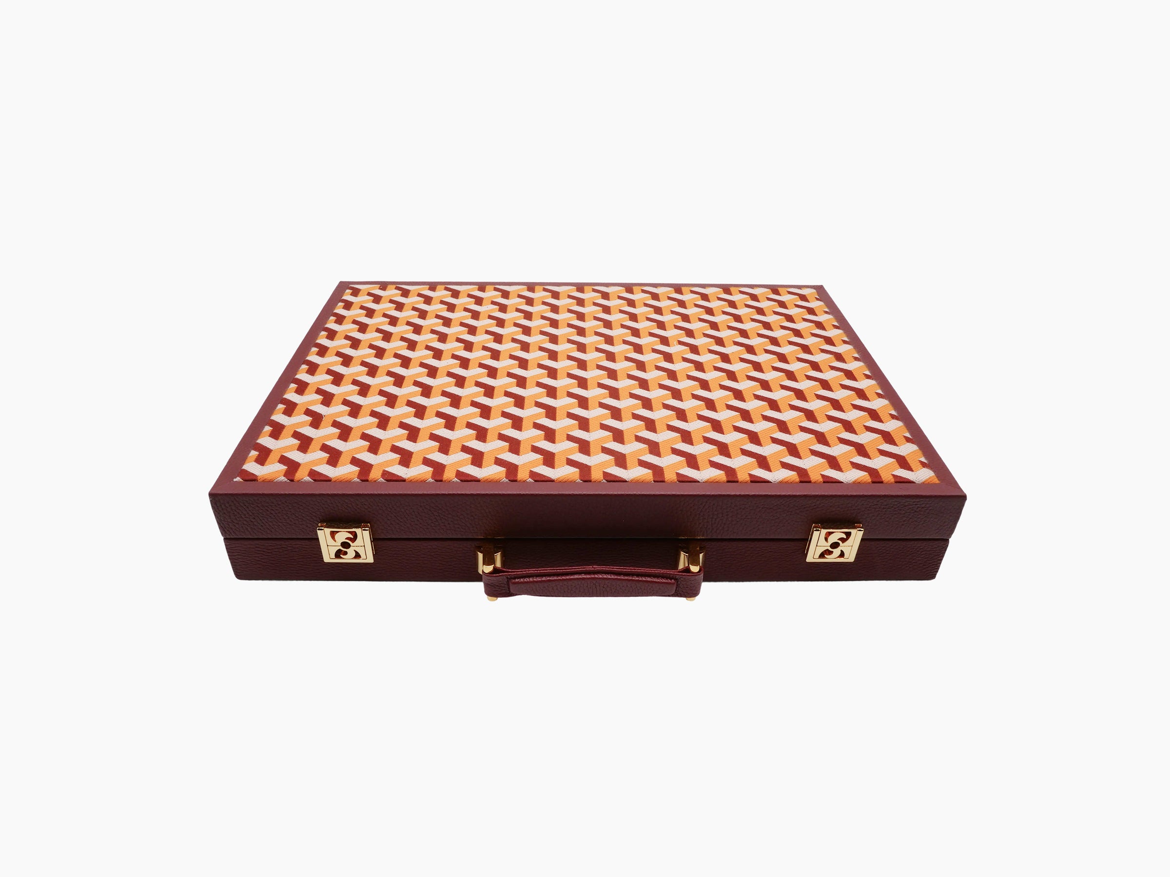 Closed burgundy leather backgammon case with orange cream geometric interior pattern and gold hardware