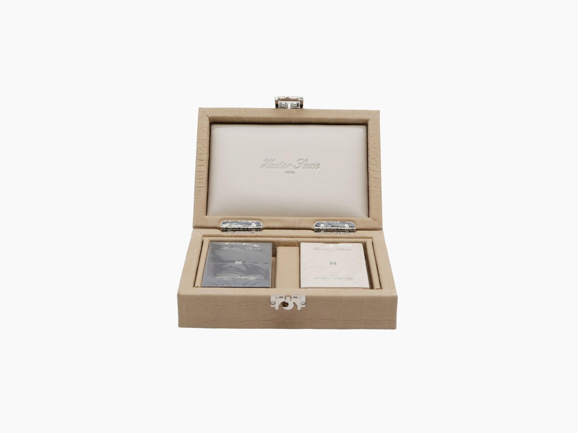 Open beige alligator-embossed card box showing two decks in inner compartments.