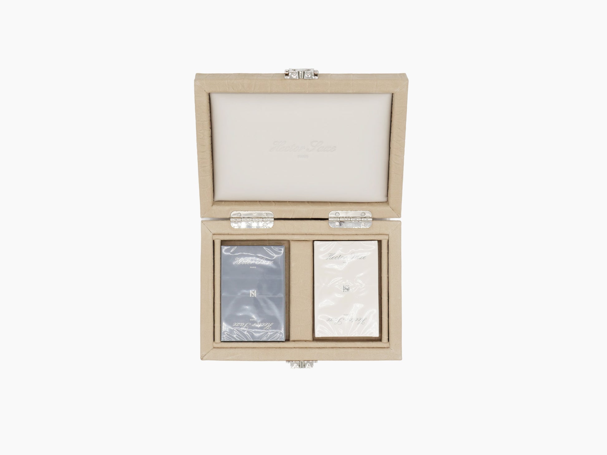 Open beige alligator-embossed card box with two plastic-coated decks inside.