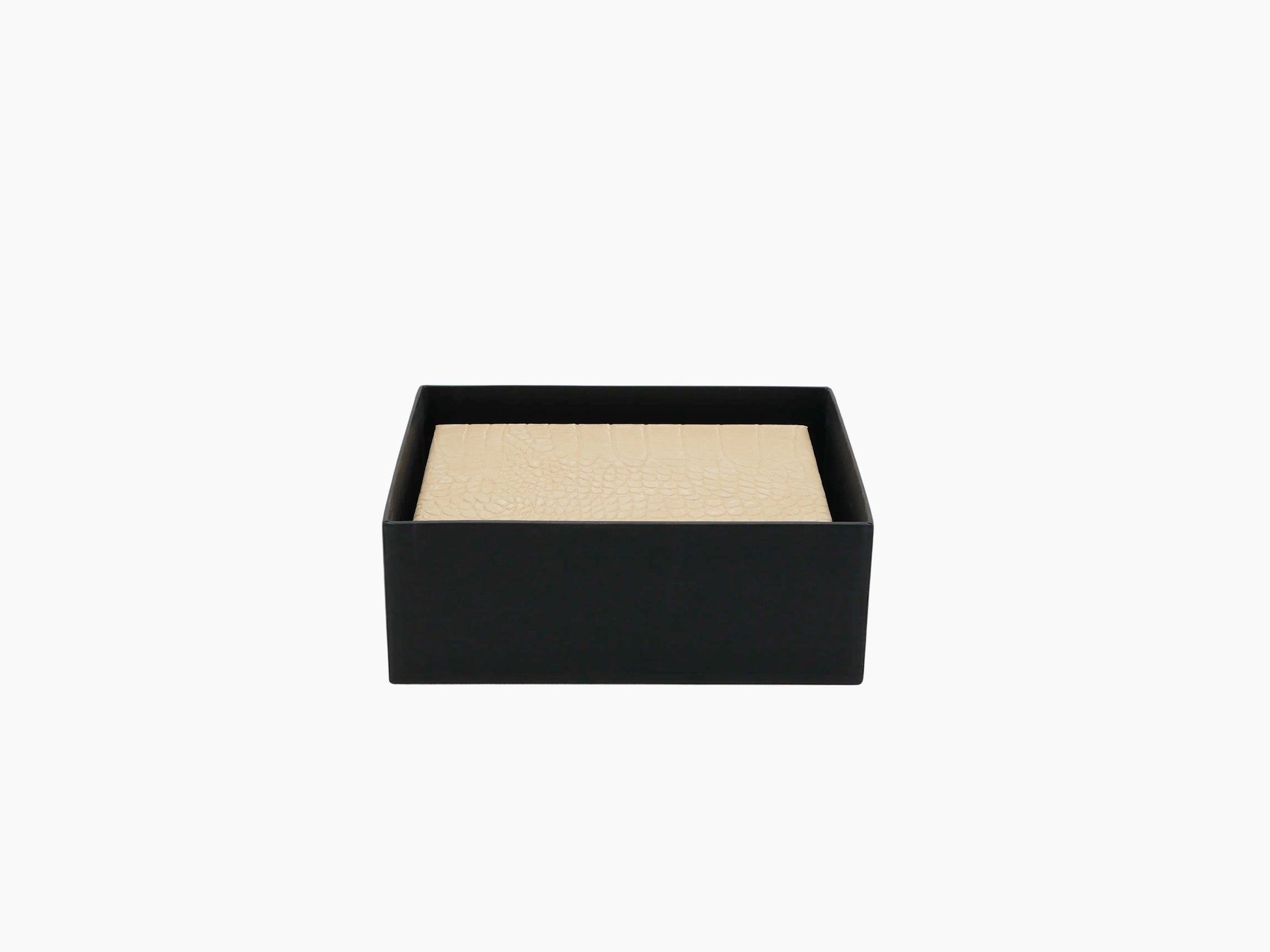 Beige alligator-embossed card box resting inside a black open gift box.