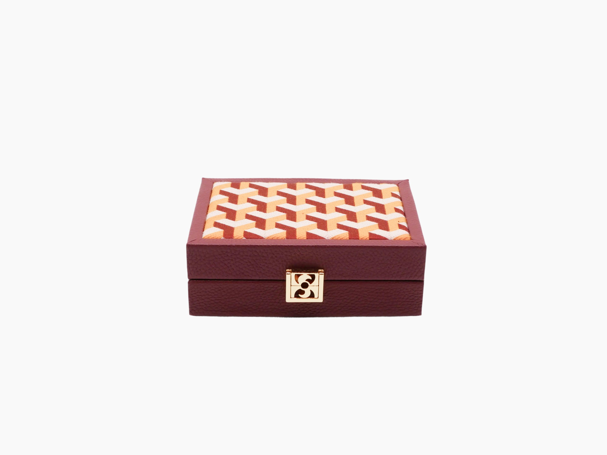 Closed burgundy buffalo leather card box with orange geometric textile lid and gold latch
