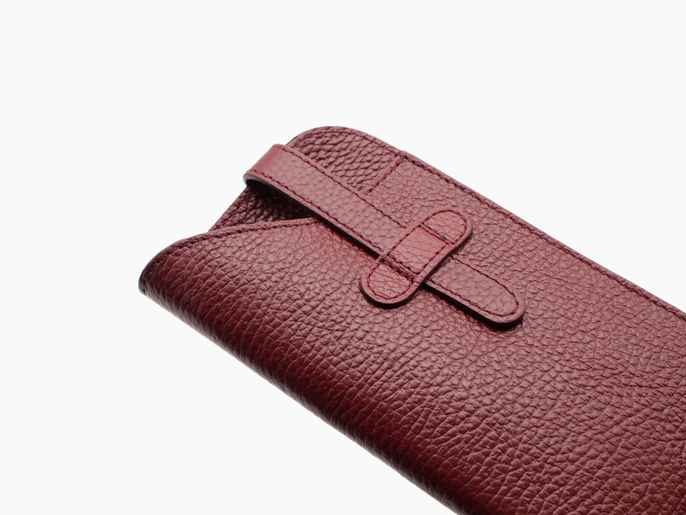 Buffalo Bordeaux leather glasses case with a strap closure