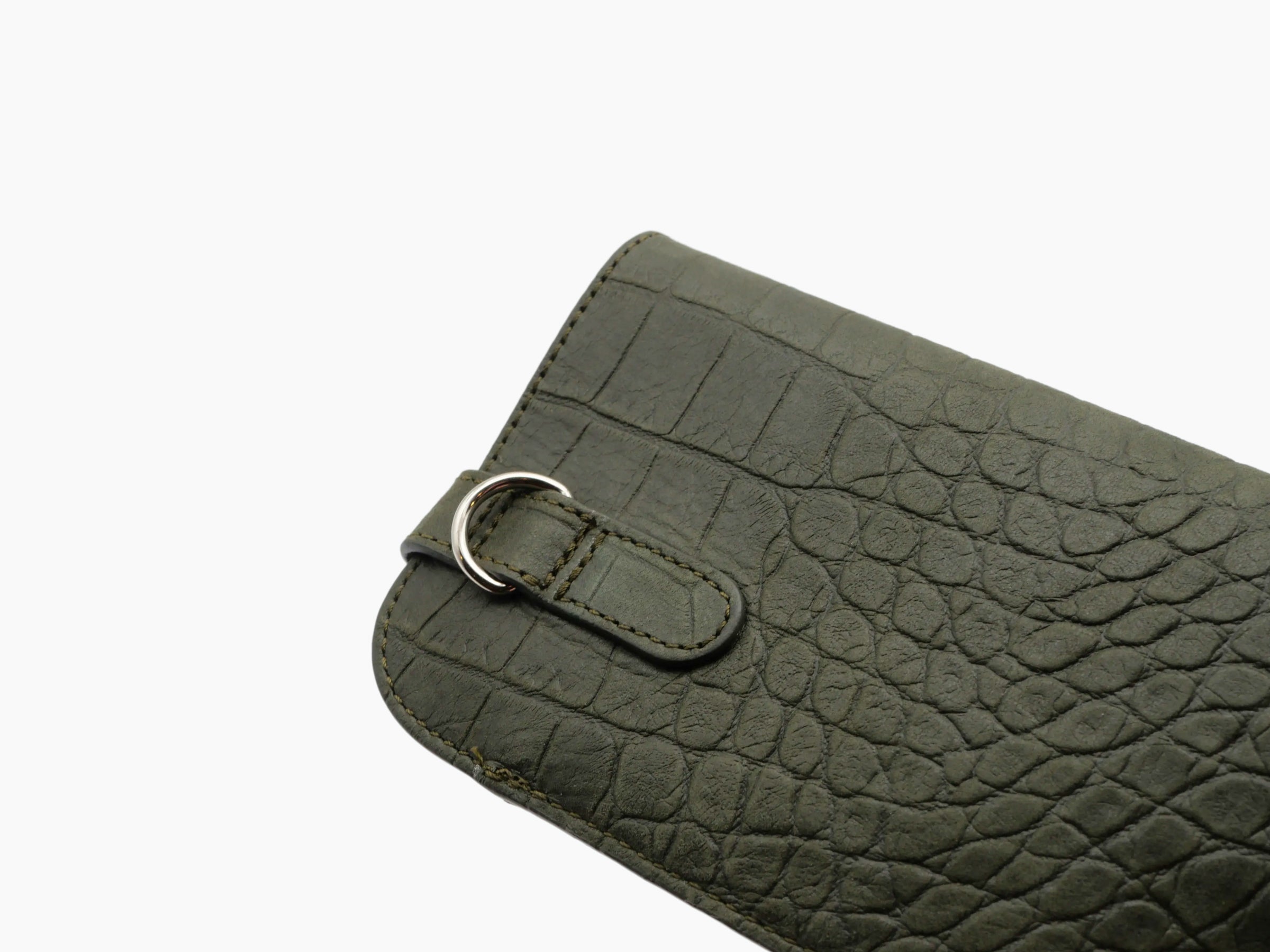 Olive green crocodile-embossed glasses case with a stitched strap and metal ring.