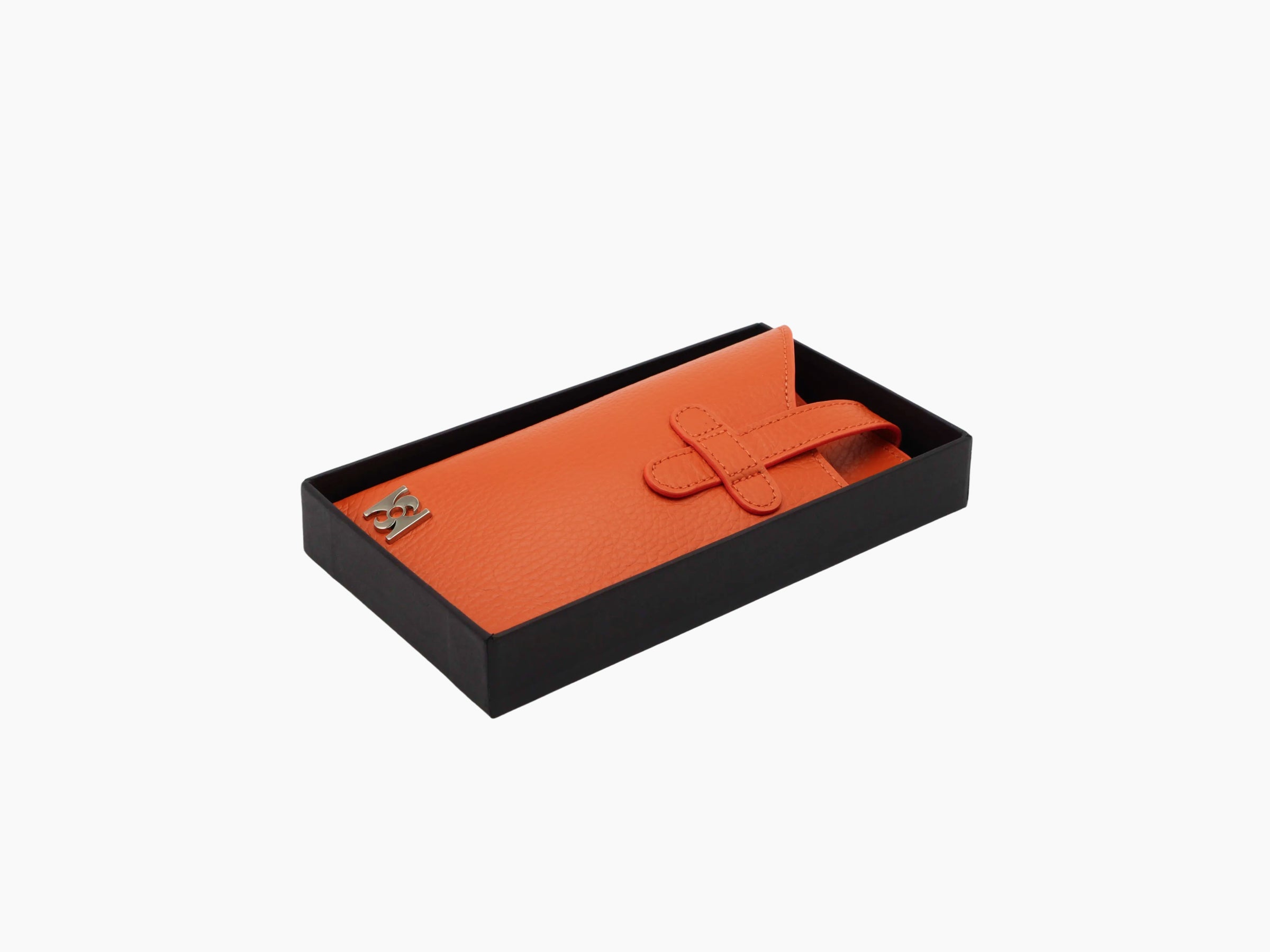 Orange Buffalo leather glasses case in a black gift box with a small metal logo