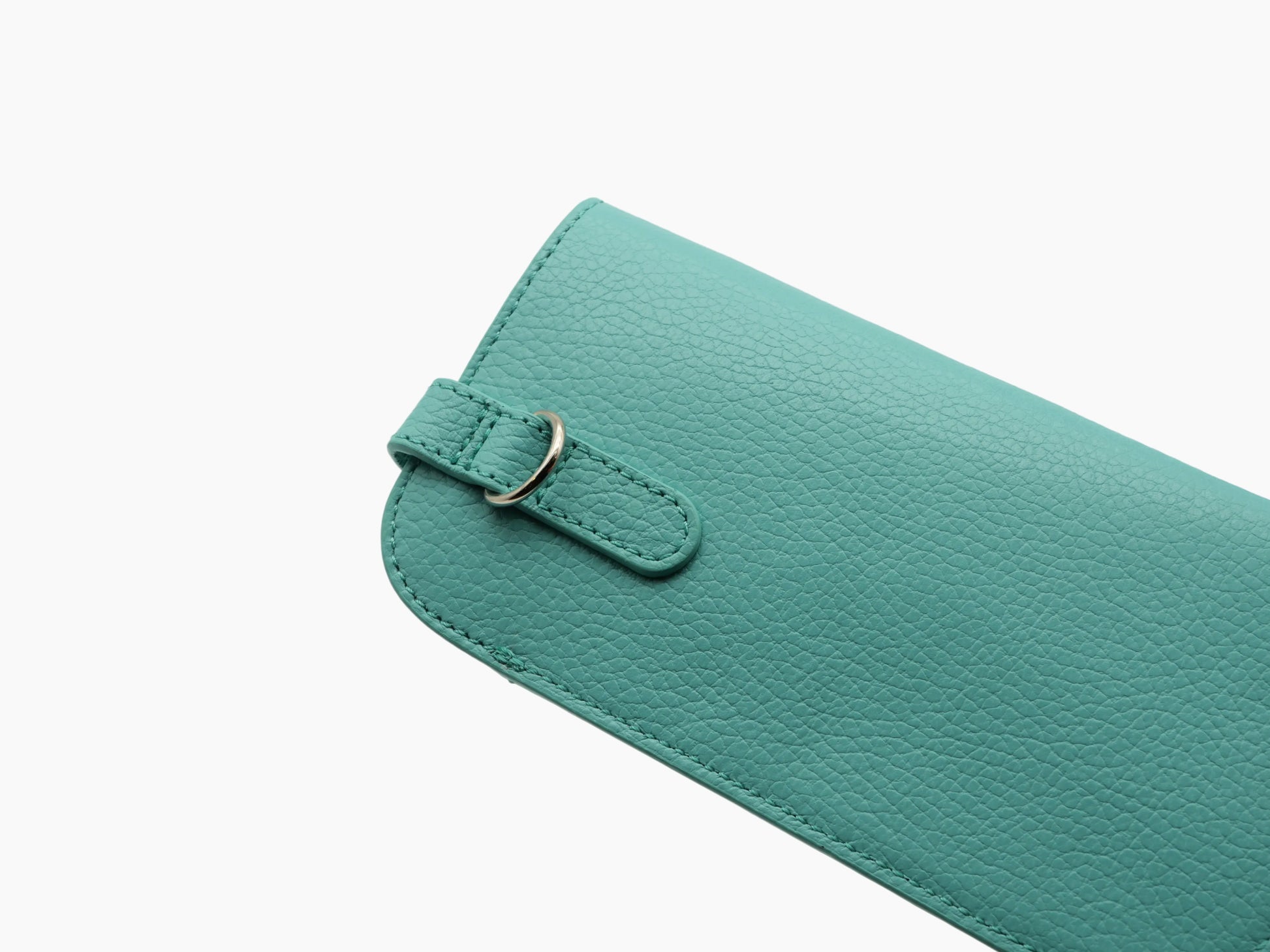 Close-up of the teal leather strap and loop on the Buffalo Blue Beetle glasses case.