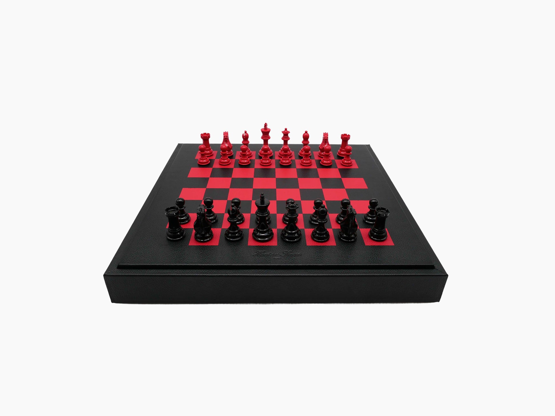 Buffalo Red Black 45cm leather chess set displayed on a black leather box with a red and black game board