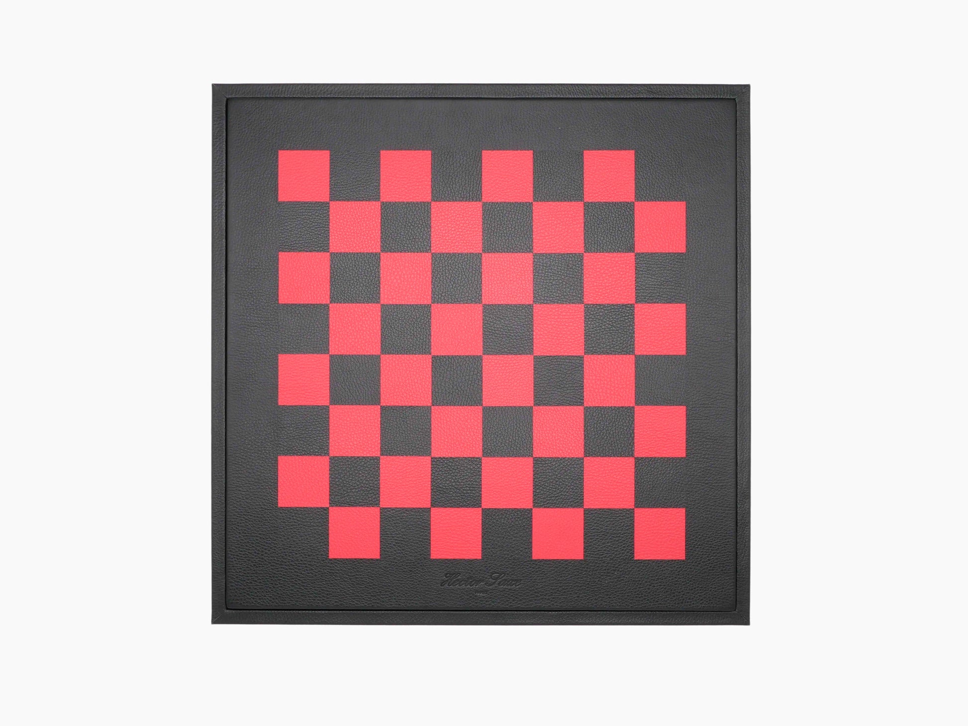 Top view of the leather wrapped chessboard lid showing a red checkered pattern on a dark background