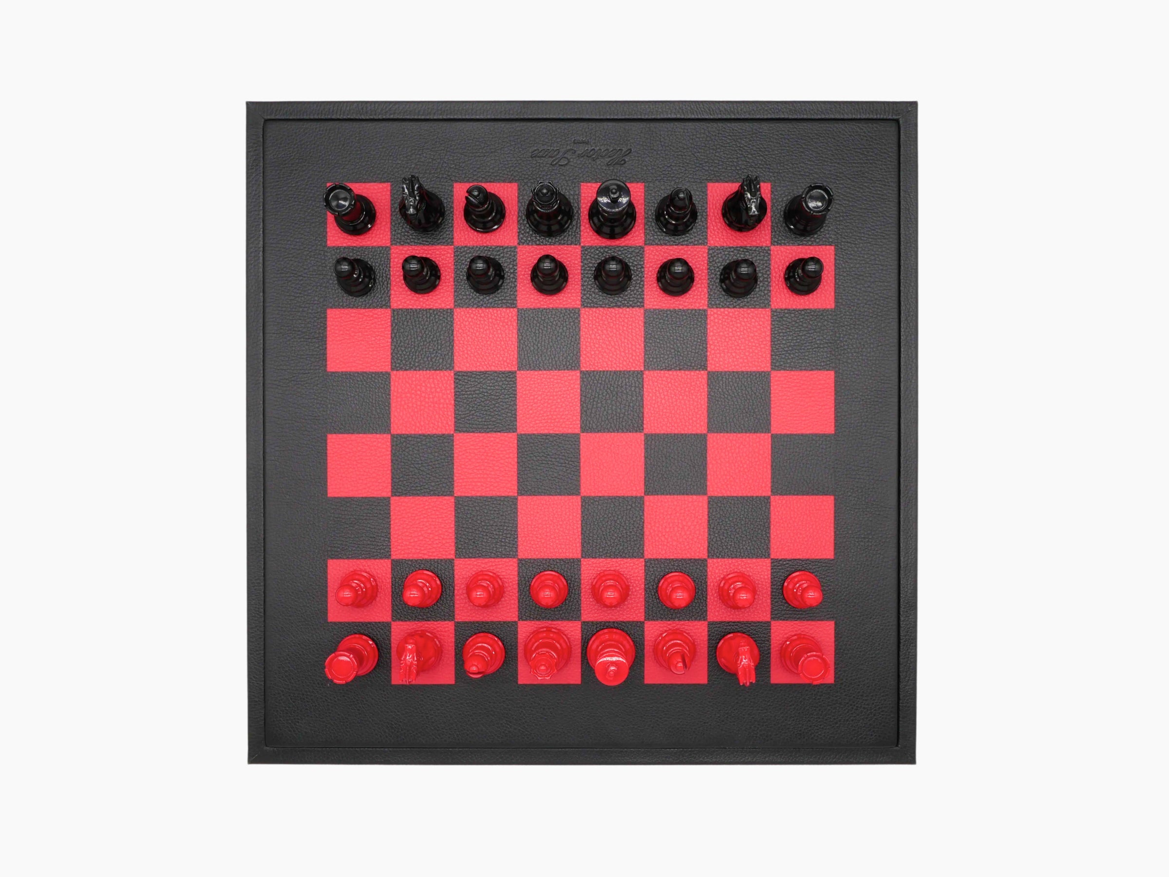 Top view of the buffalo red black chessboard showing a red and black checker pattern with pieces arranged along the edges