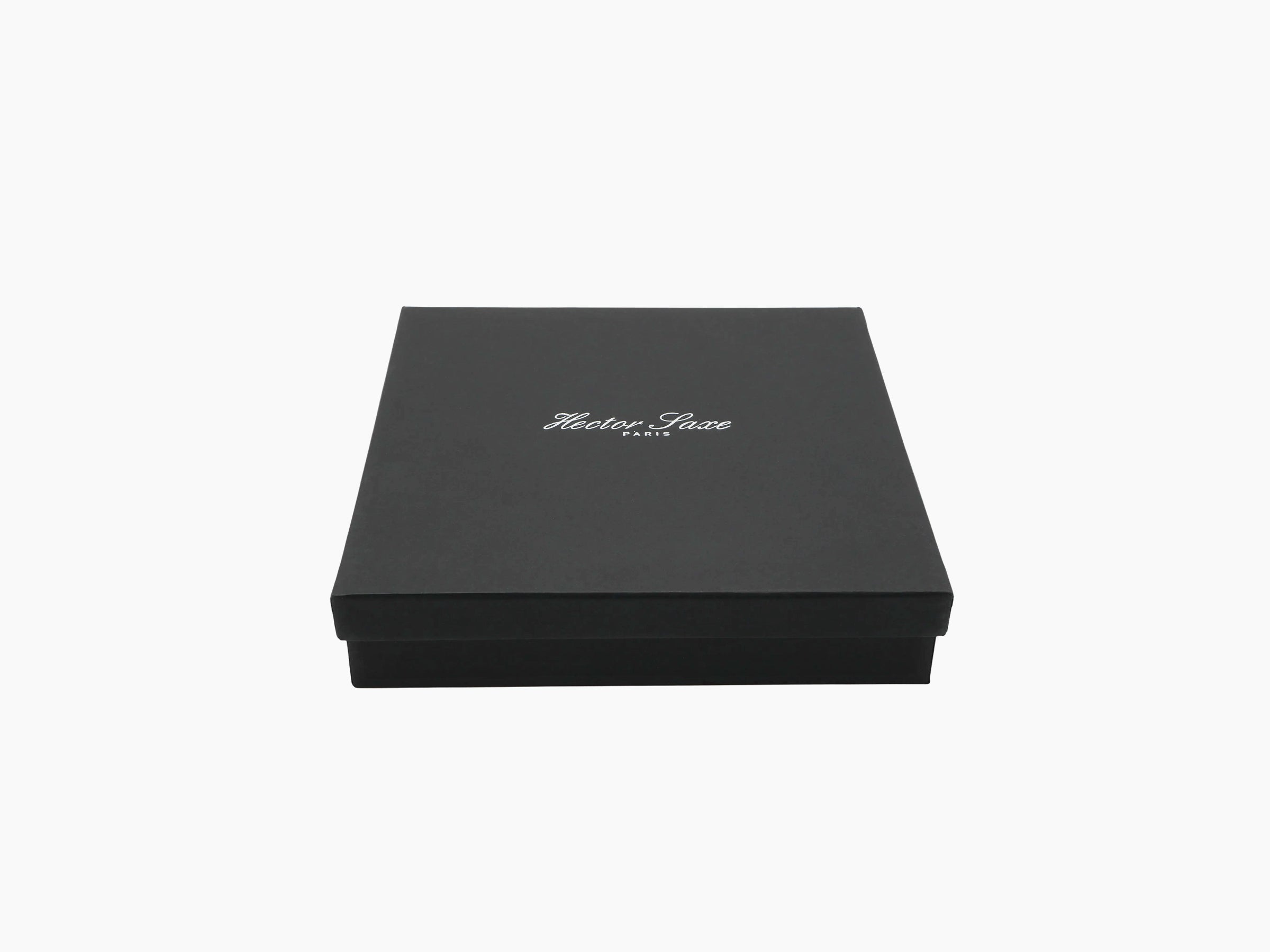 Black gift box with white Hector Saxe Paris logo on the lid