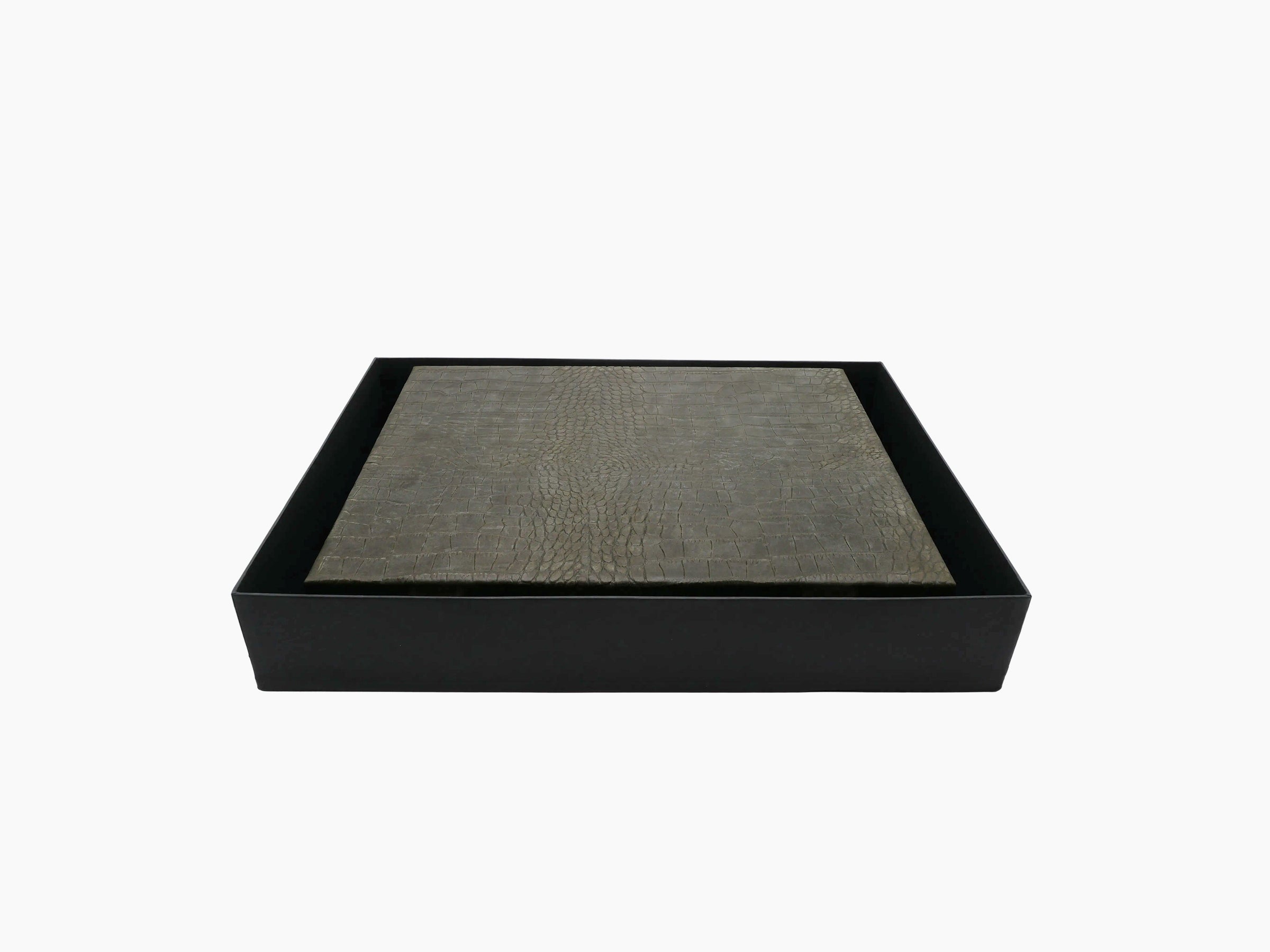 Grey alligator-embossed leather poker set case lid in a black presentation box.