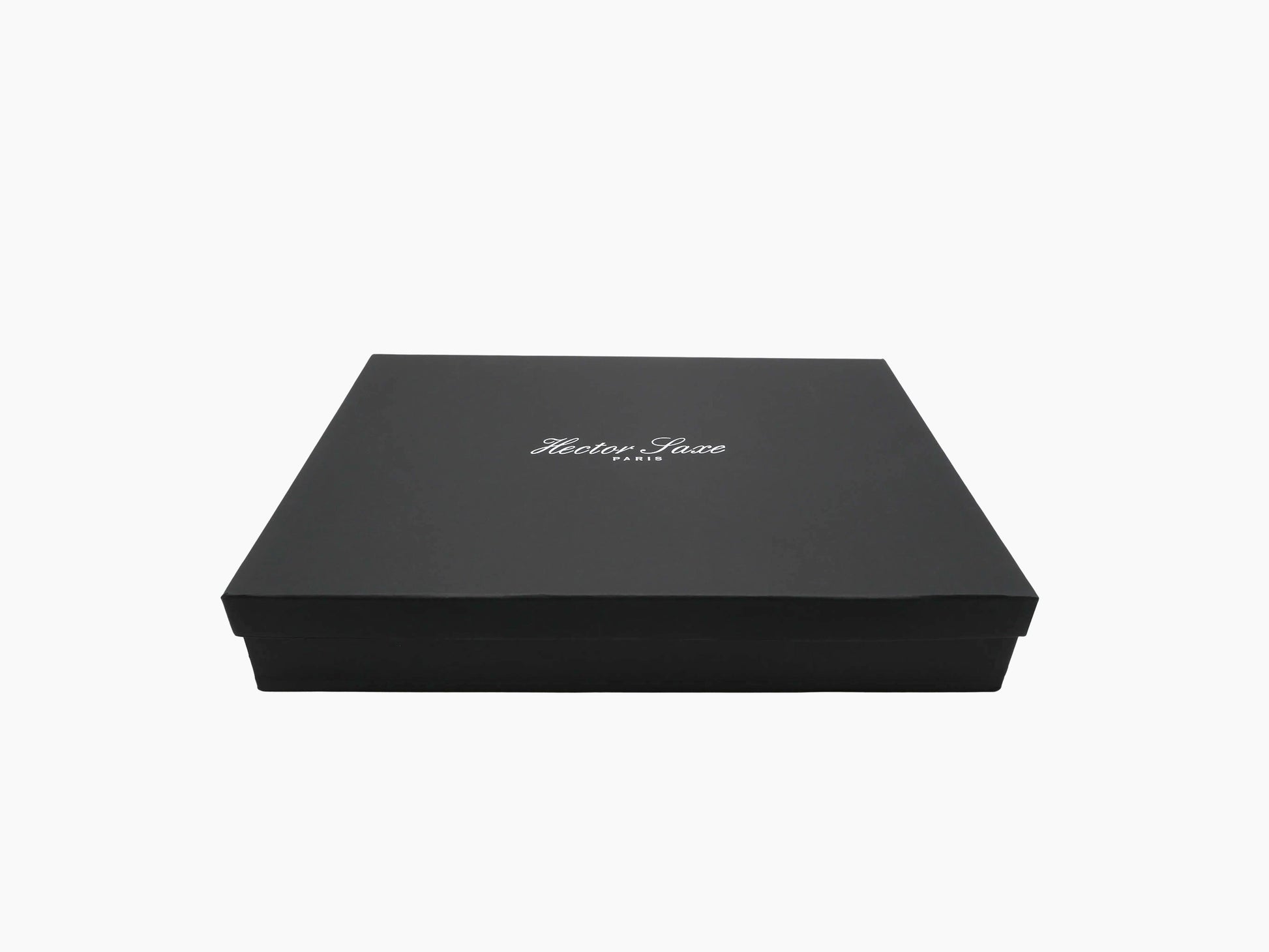 Black gift box with Hector Saxe Paris logo on the lid.