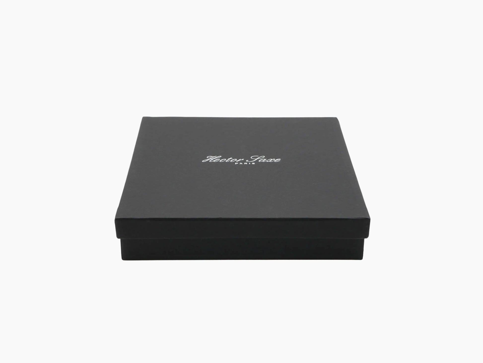 Black alligator-embossed leather tic tac toe box with lid closed