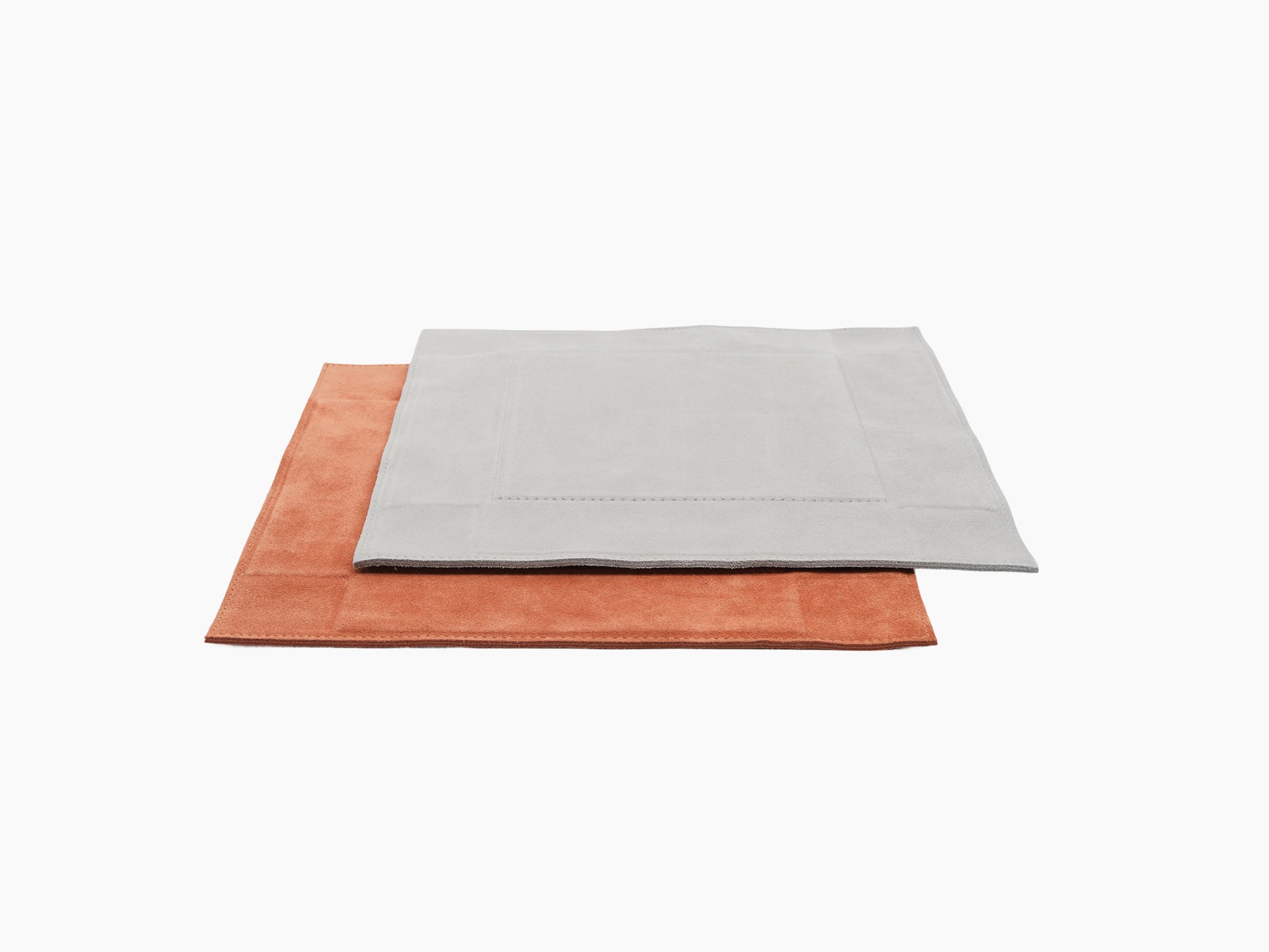 Layered Jack Valet Tray Square large with light gray leather top over rust suede base.