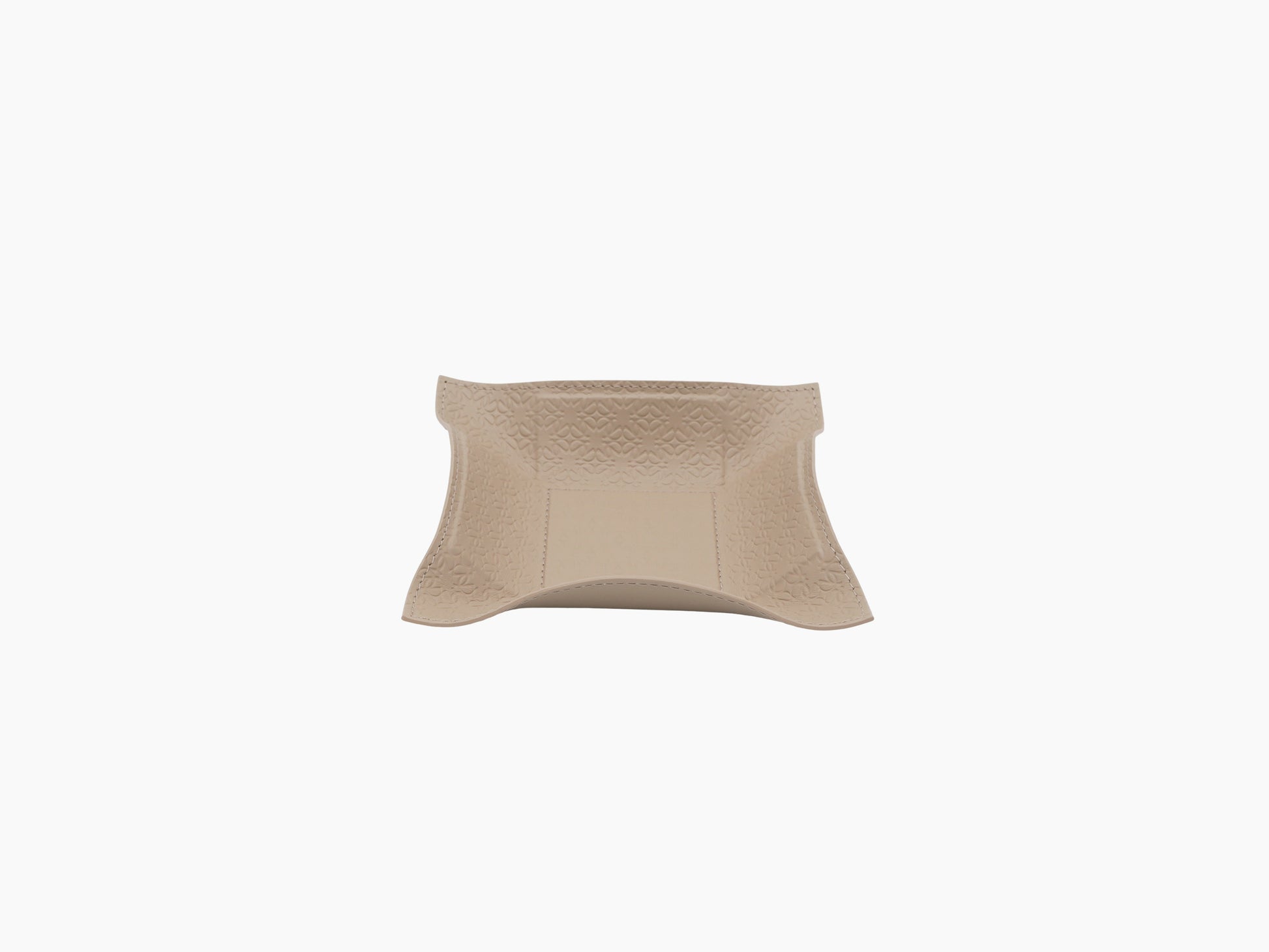 Beige embossed leather square valet tray laid flat with curved edges