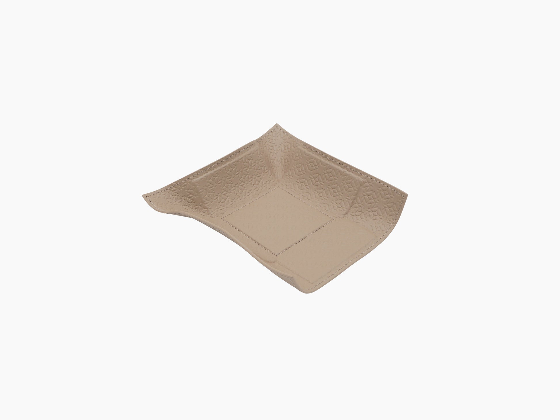 Beige leather valet tray embossed with Elie Saab monogram and stitched edge.