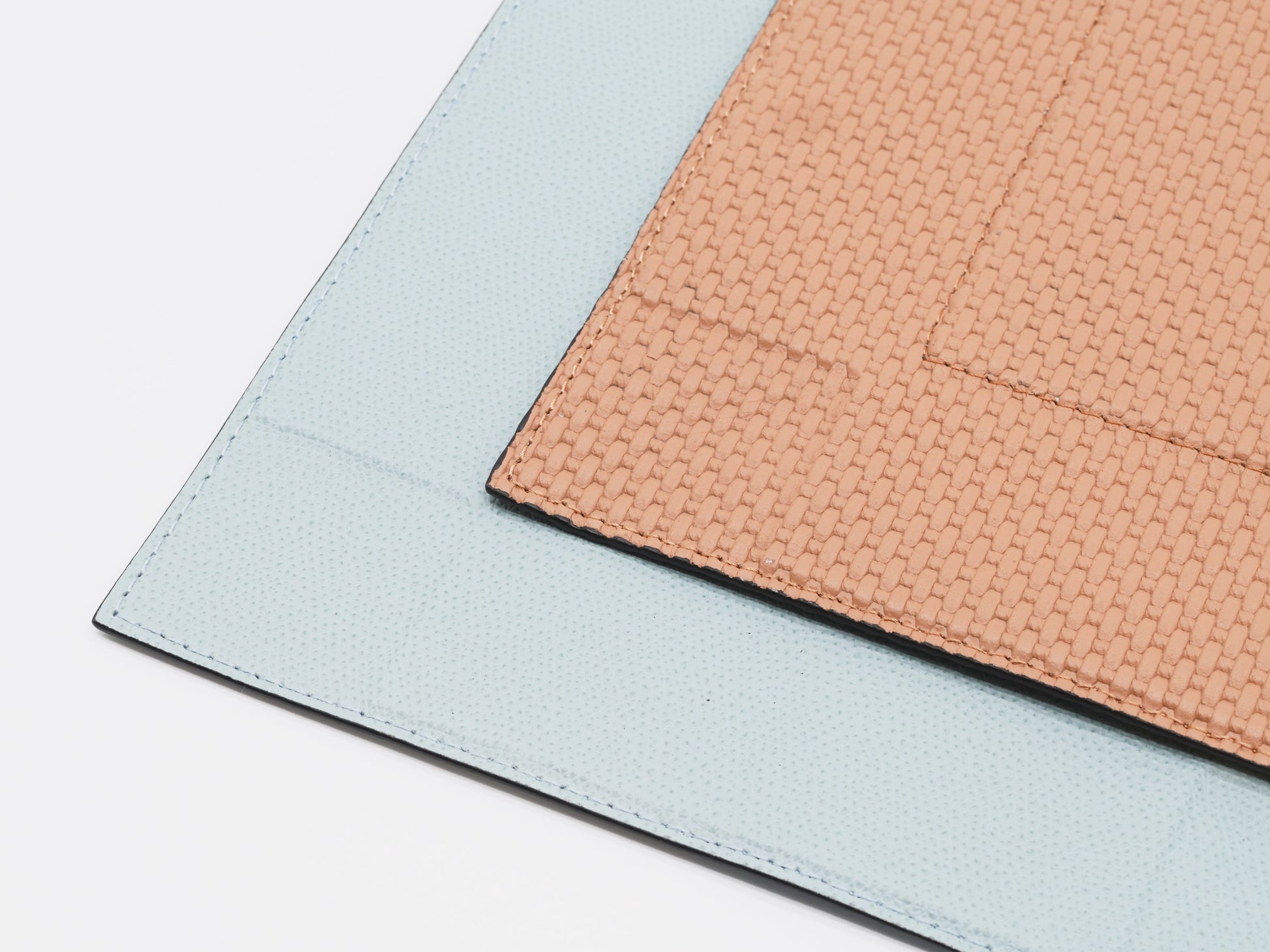Two tone valet tray with pale blue base and peach basketweave top