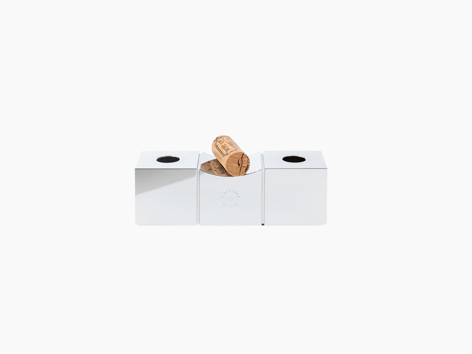 Open white box packaging reveals Bouchons Millésimés Silver components with cork and metal fittings arranged inside
