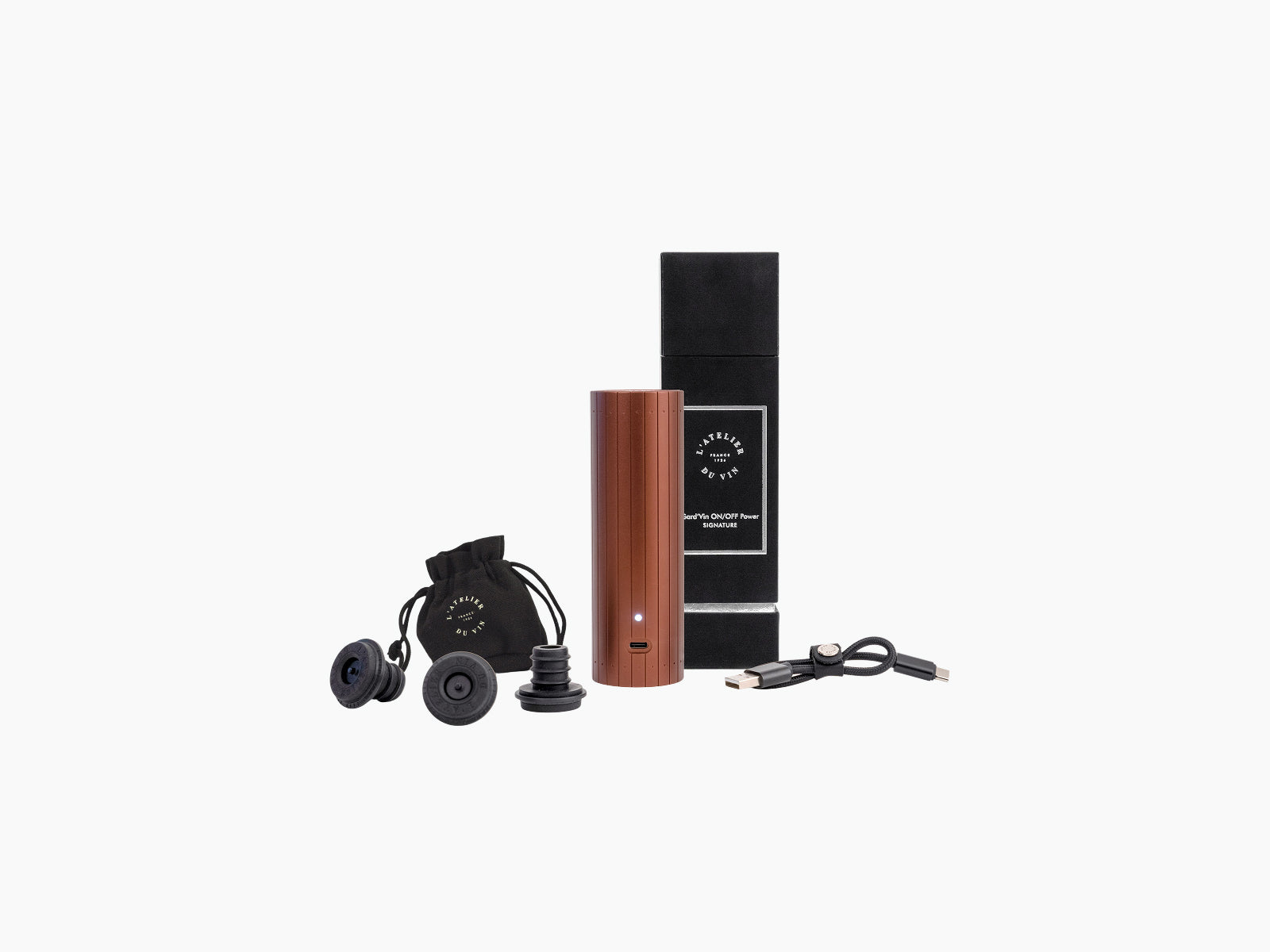 Gard’Vin On/Off Power Signature kit with copper-red cylinder, charging cable, and pouch in front of the black box