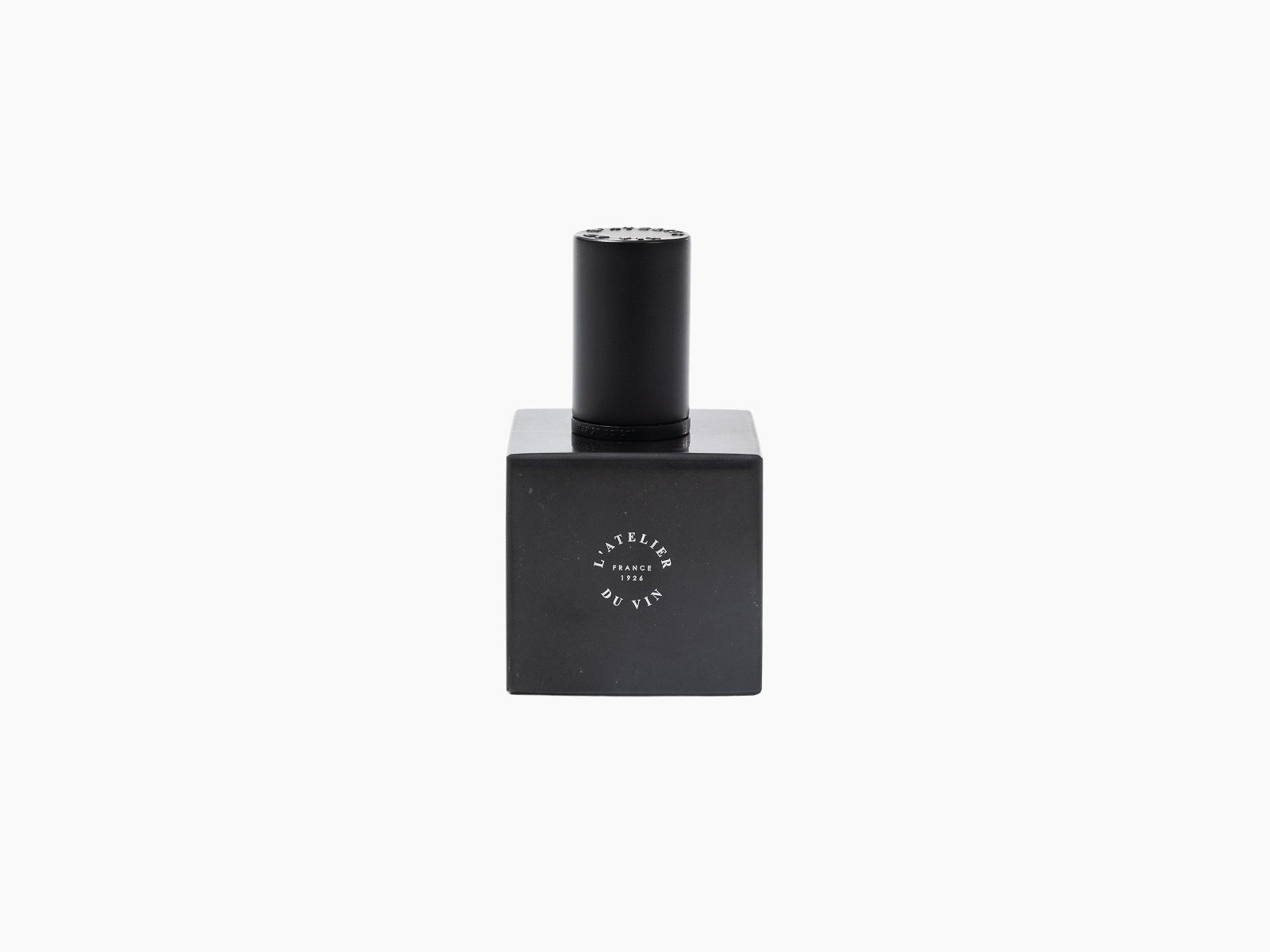 Le Bouchon Black wine stopper on a square base with a circular logo.