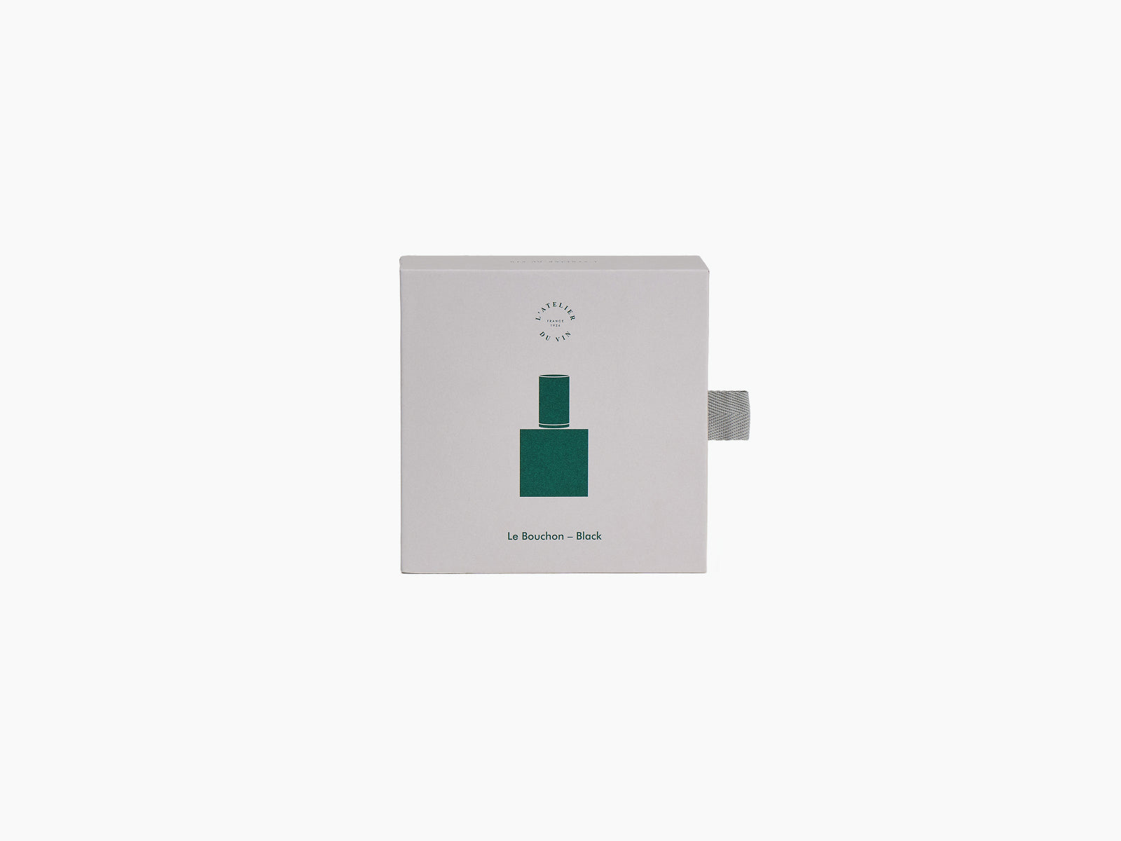 Le Bouchon Black packaging box with a green geometric emblem and a gray fabric pull tab