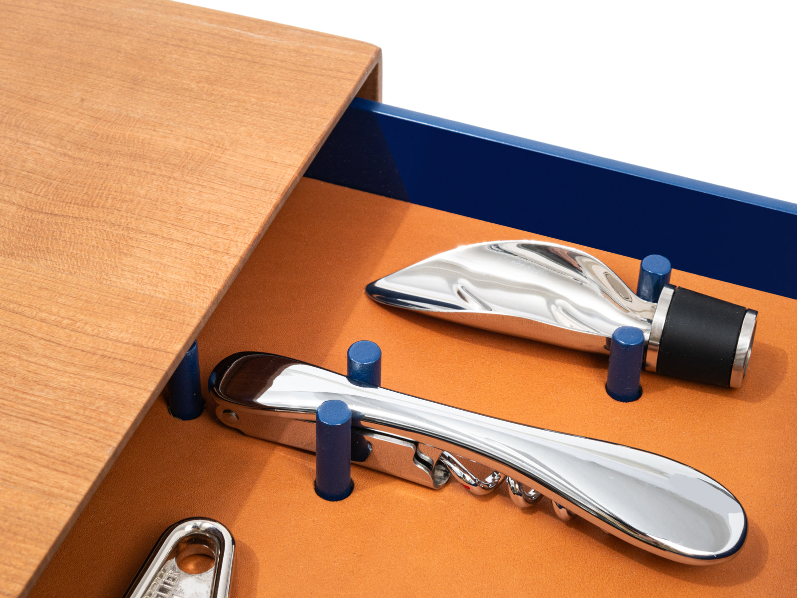 Le Plateau wine service set in a wooden box with chrome corkscrew and foil cutter secured by blue pegs