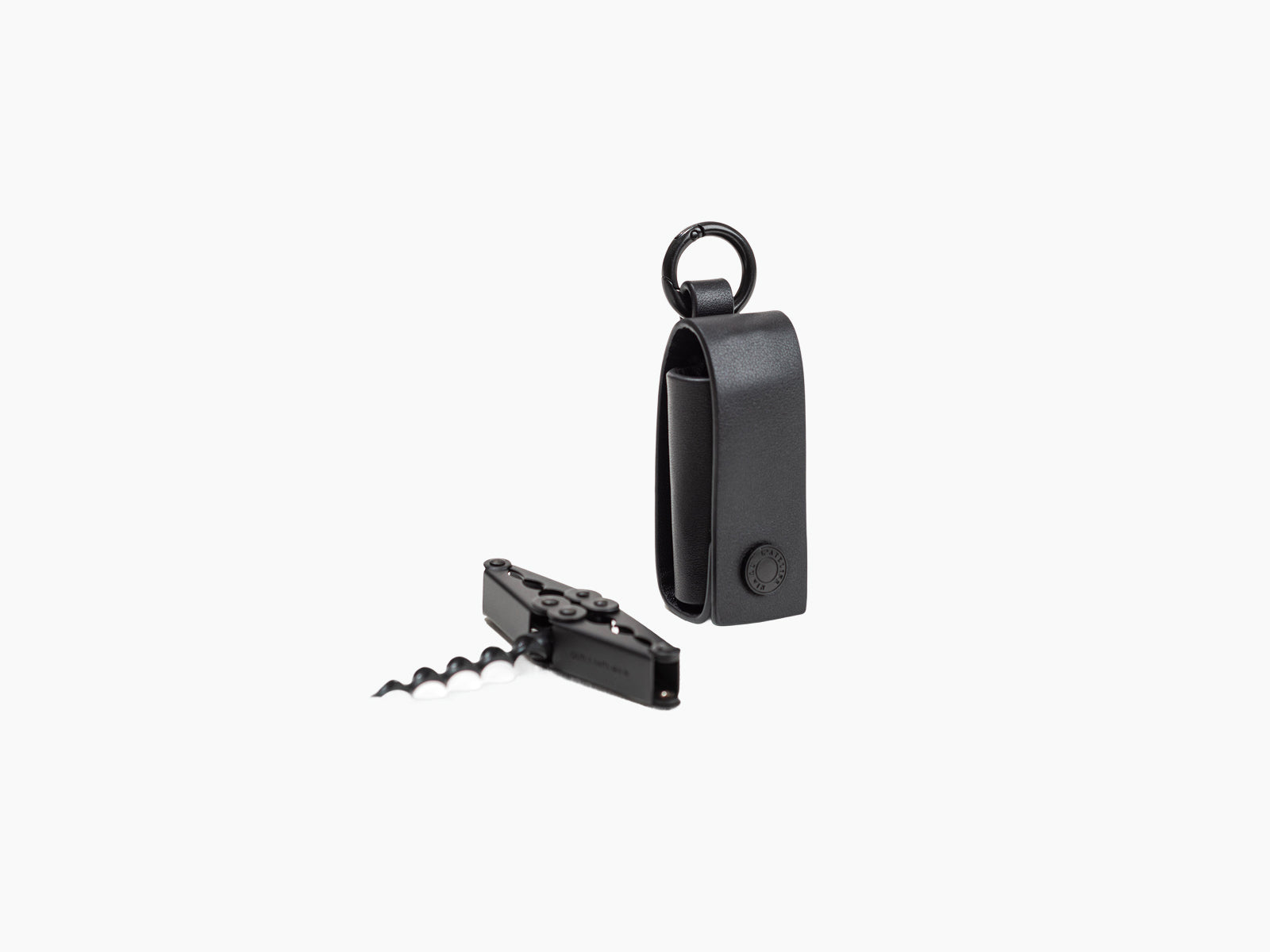 Compact black pocket corkscrew beside its black leather sheath with a hanging ring