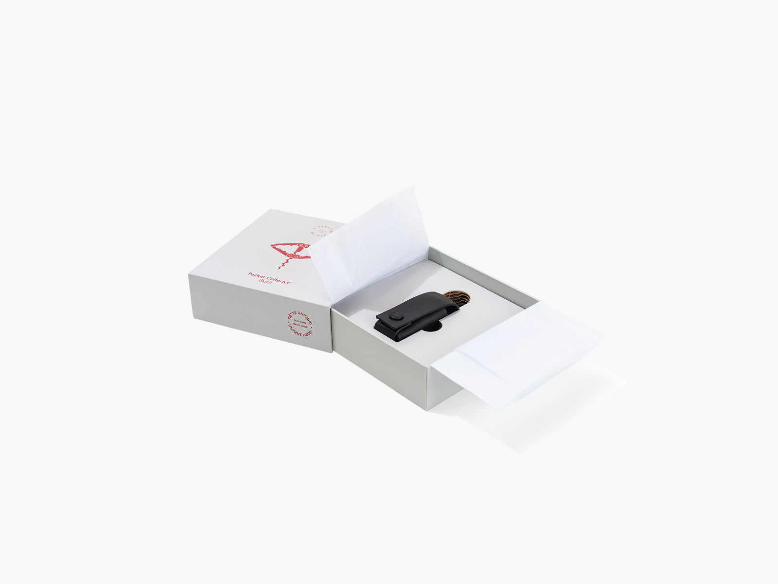 Open box reveals black Pocket Collector corkscrew placed on a white insert