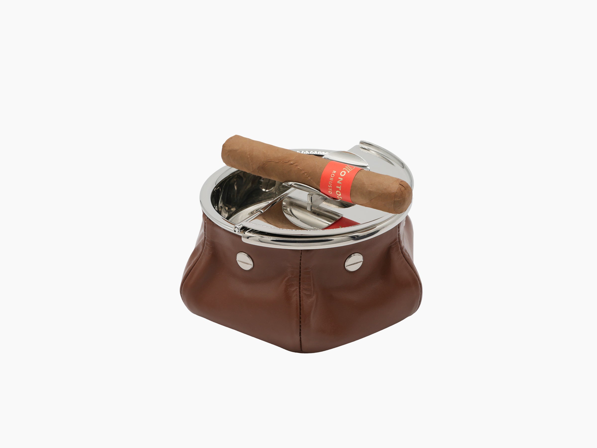 Laurence Bean Bag Ashtray with brown leather base and polished chrome top, cigar resting across the opening.