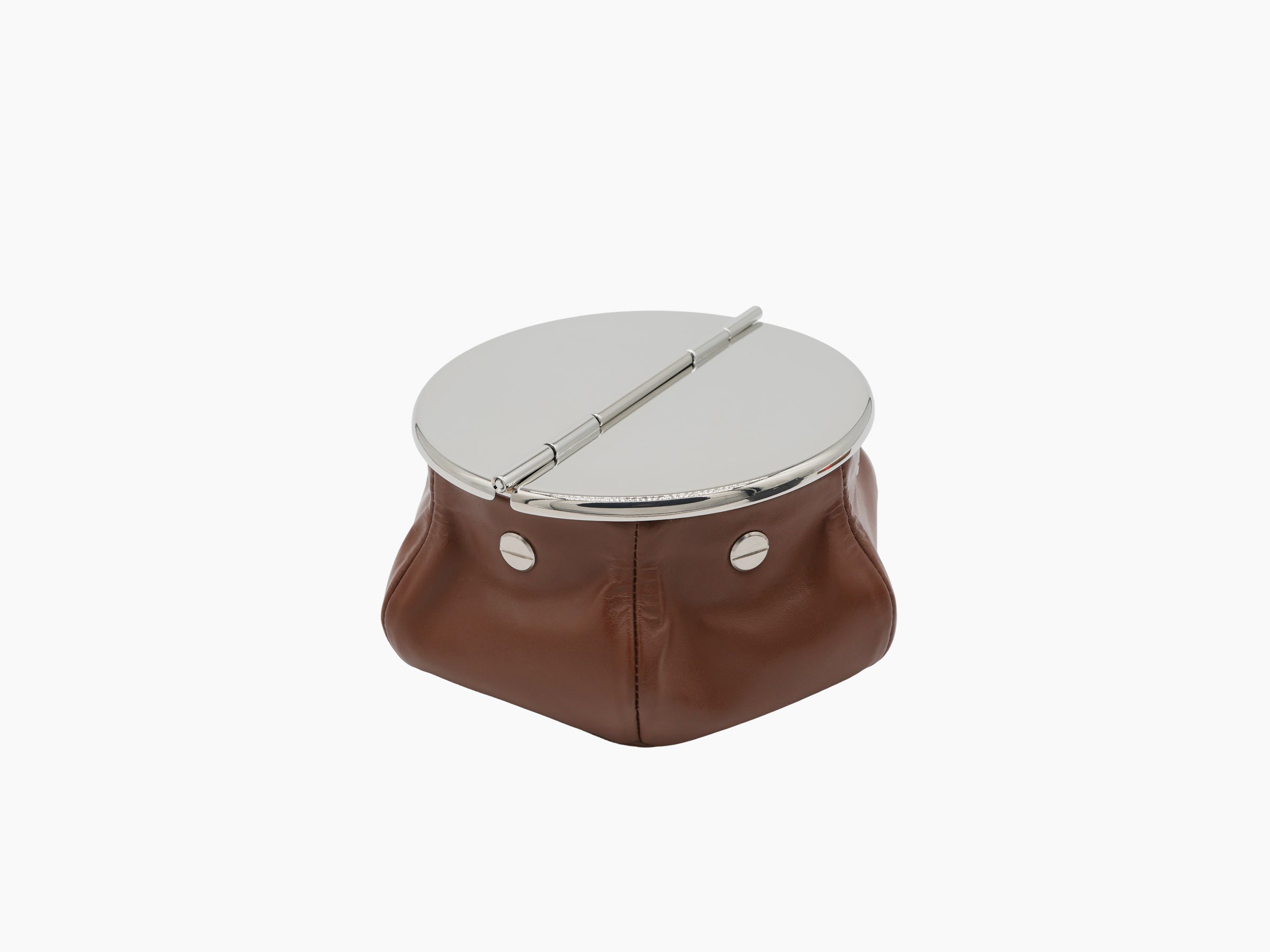 Laurence Bean Bag Ashtray with brown leather base and chrome top, cigar balanced on the edge.