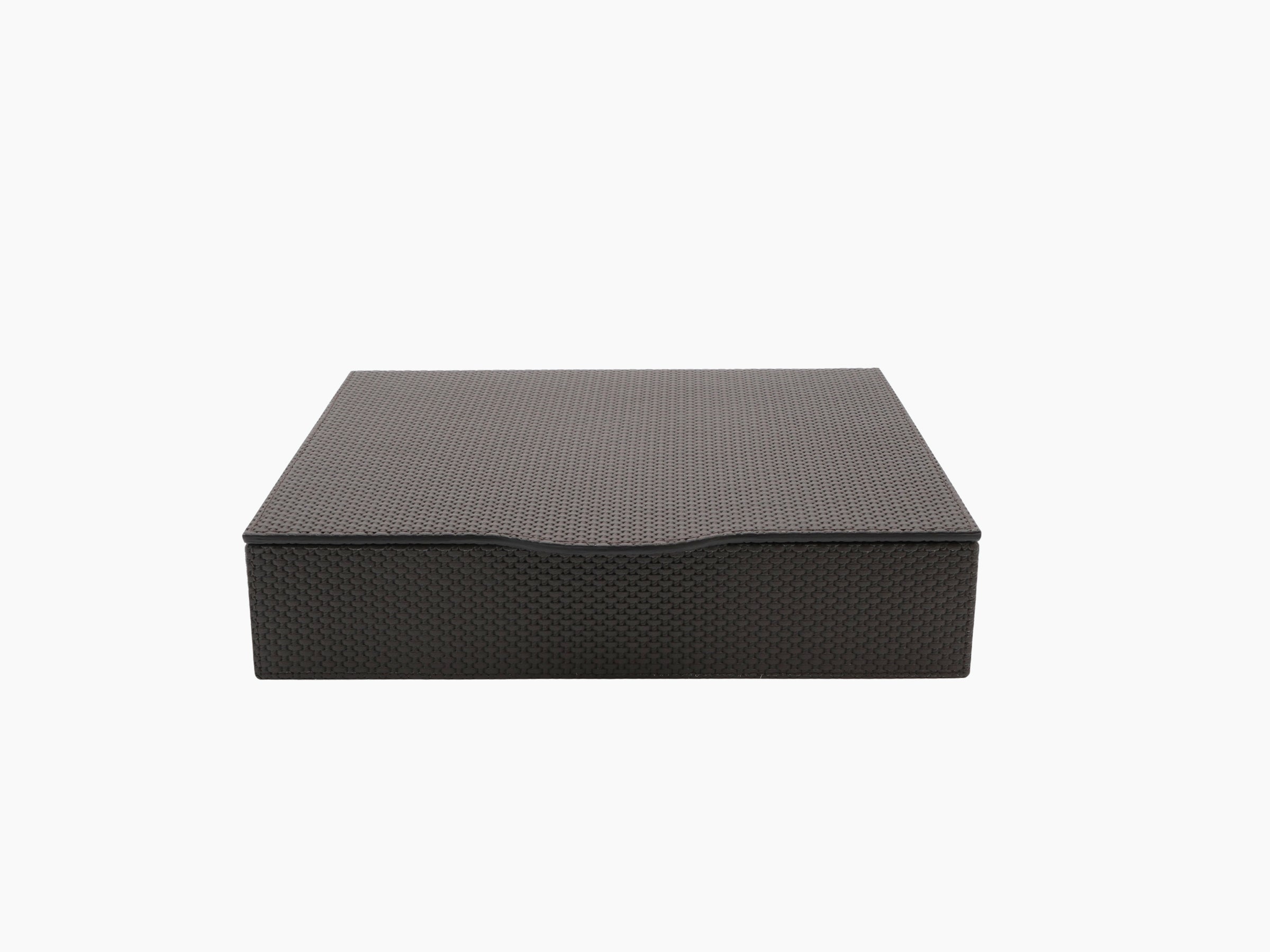 Luna Box for Nespresso closed in dark woven leather with a hinged lid.