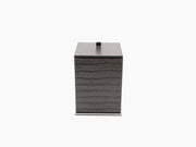 Crocodile embossed leather manicure set box with a metal clasp on the lid.