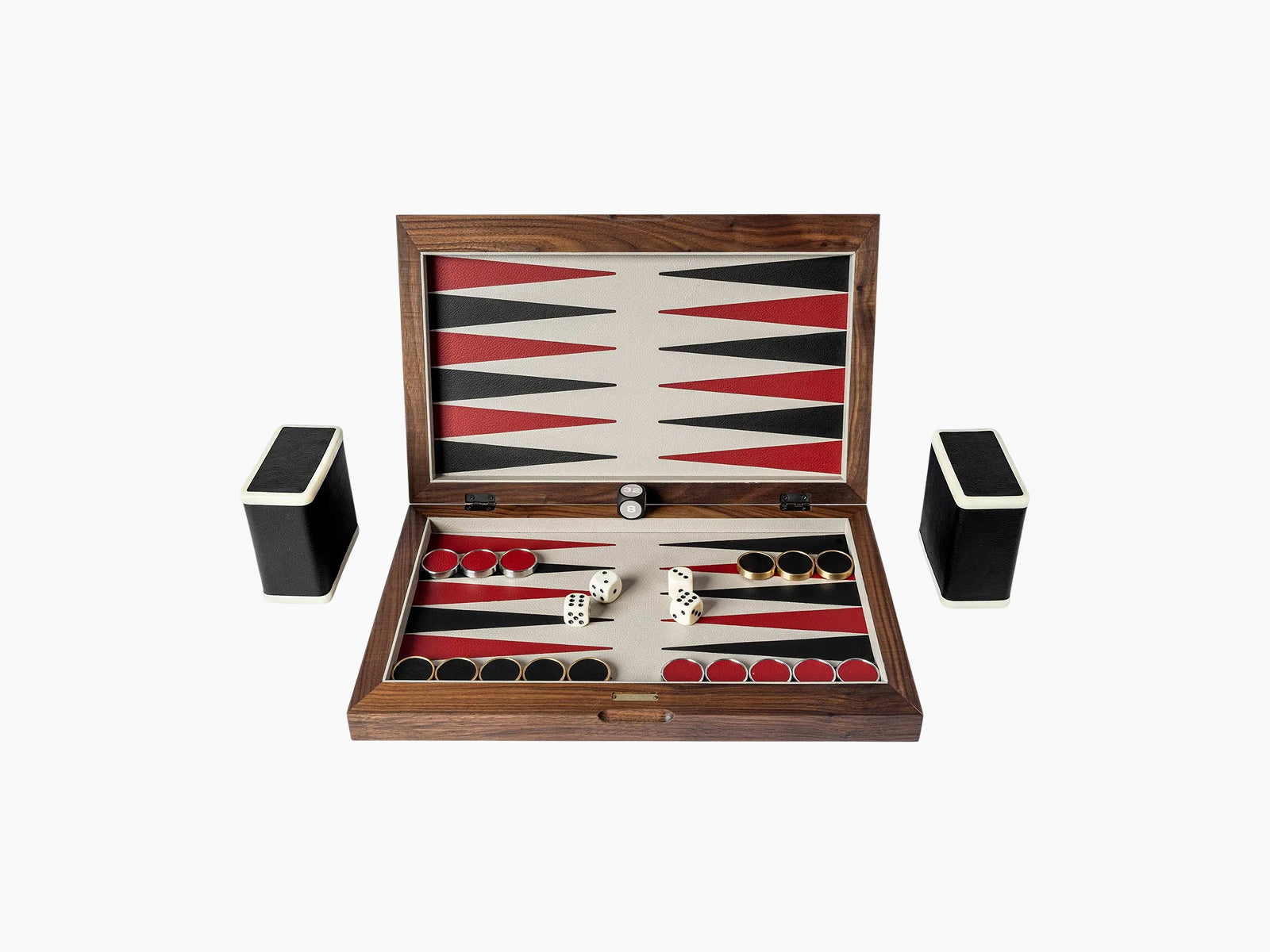 Walnut backgammon set opened, board shows red black and cream triangles with dice and cups arranged inside.