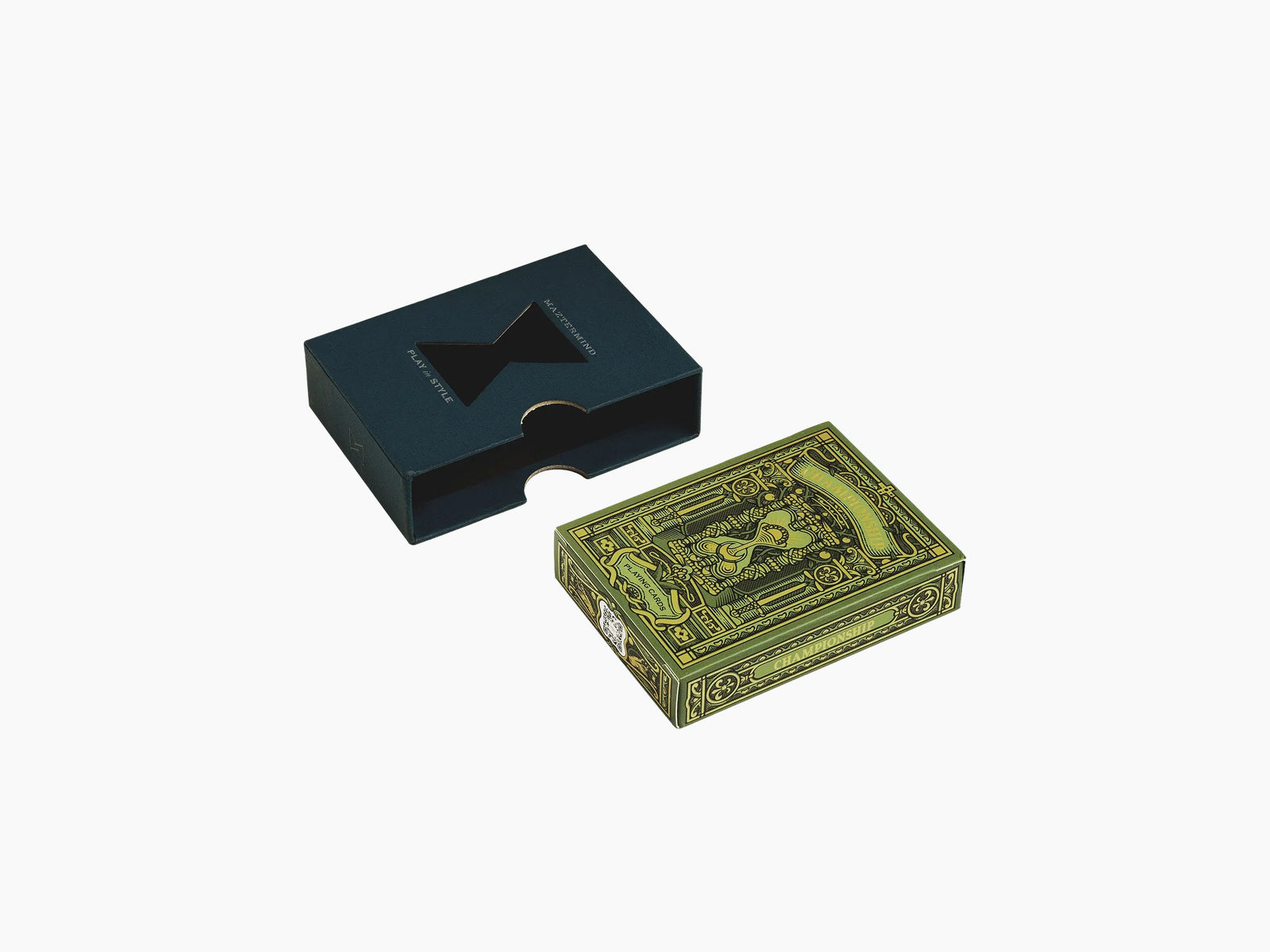 Navy blue Championship Playing Cards box with a cutout beside an ornate green and gold deck.