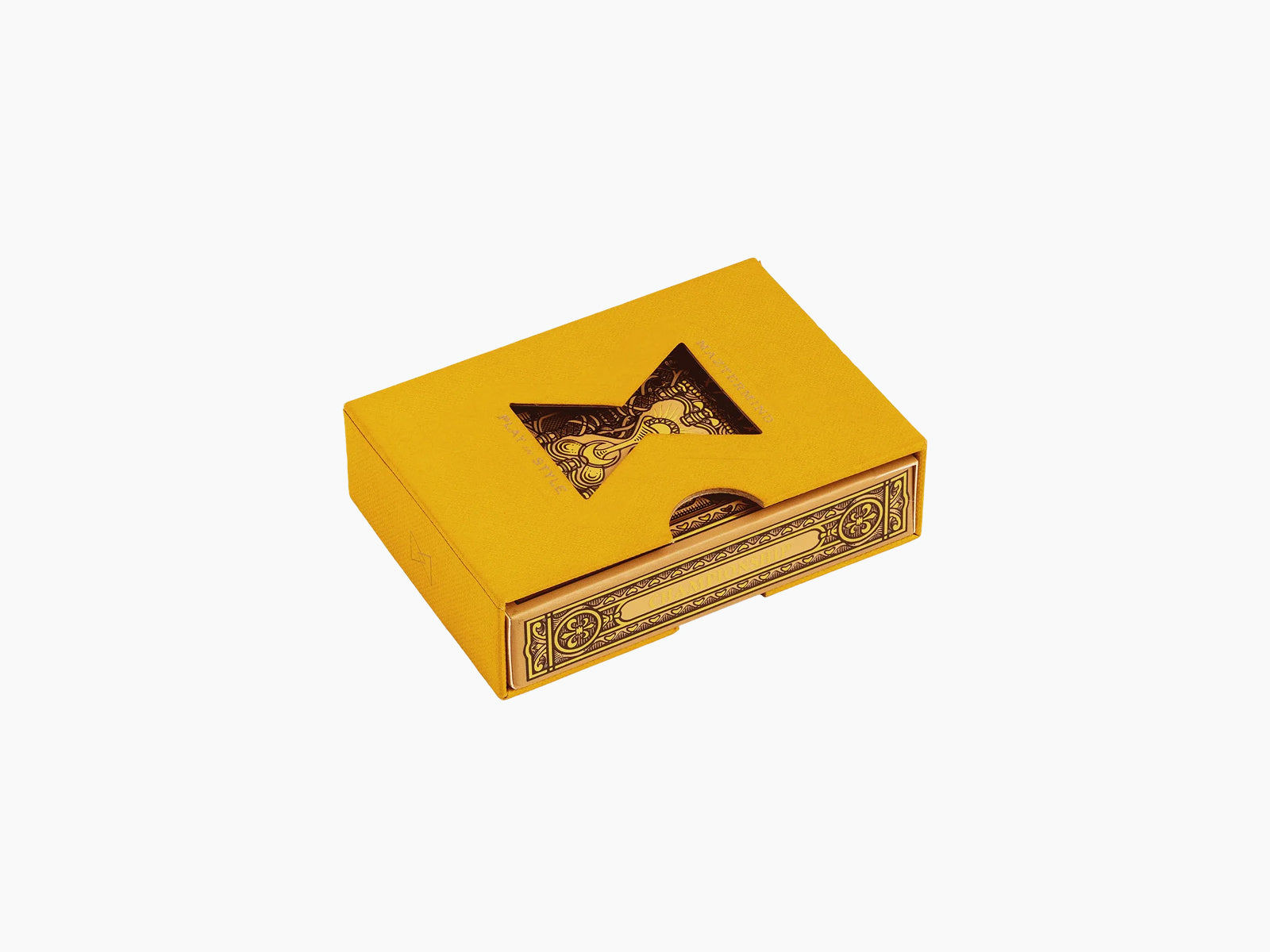Yellow Championship Playing Cards box with a triangular cutout revealing an ornate interior.