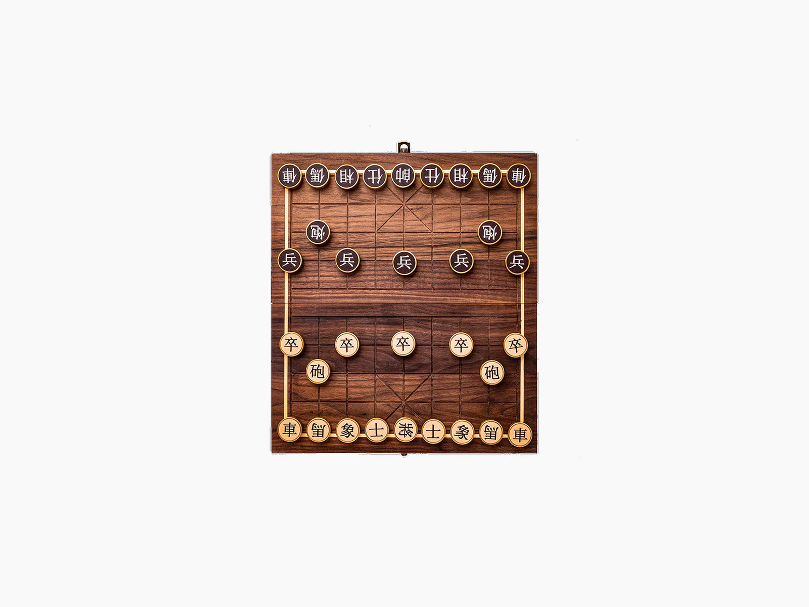 Compact walnut Chinese chess board with bronze game pieces arranged for play