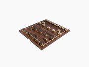 Compact Chinese chess set with walnut board and bronze pieces arranged for play