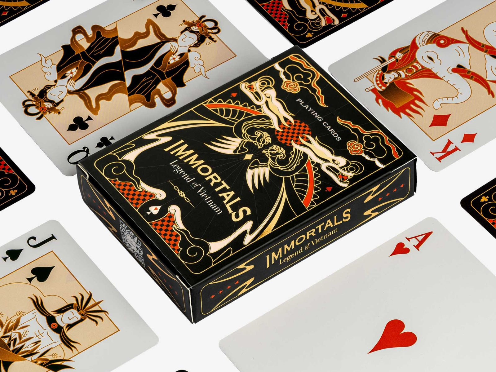 Immortals playing cards black box with gold dragon design surrounded by scattered cards