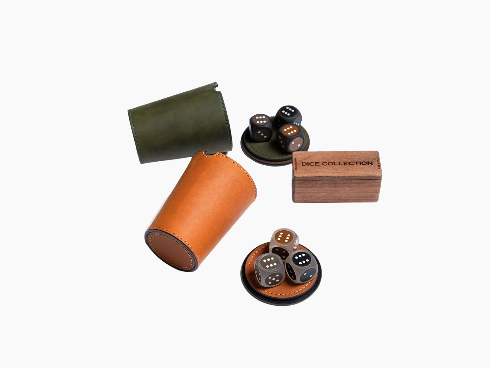Leather Dice Shaker Cup Set with green and tan leather cups and a wooden DICE COLLECTION box.