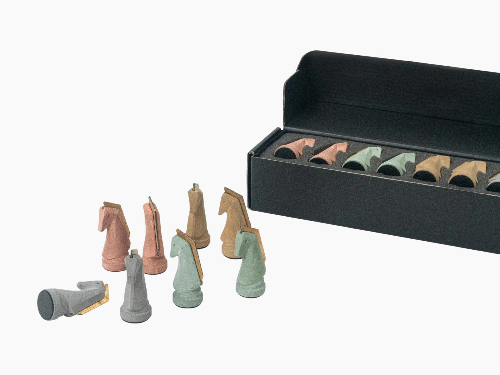 Trojan Horse Race Ludo set features pastel cement horses beside a boxed game board inside a black container