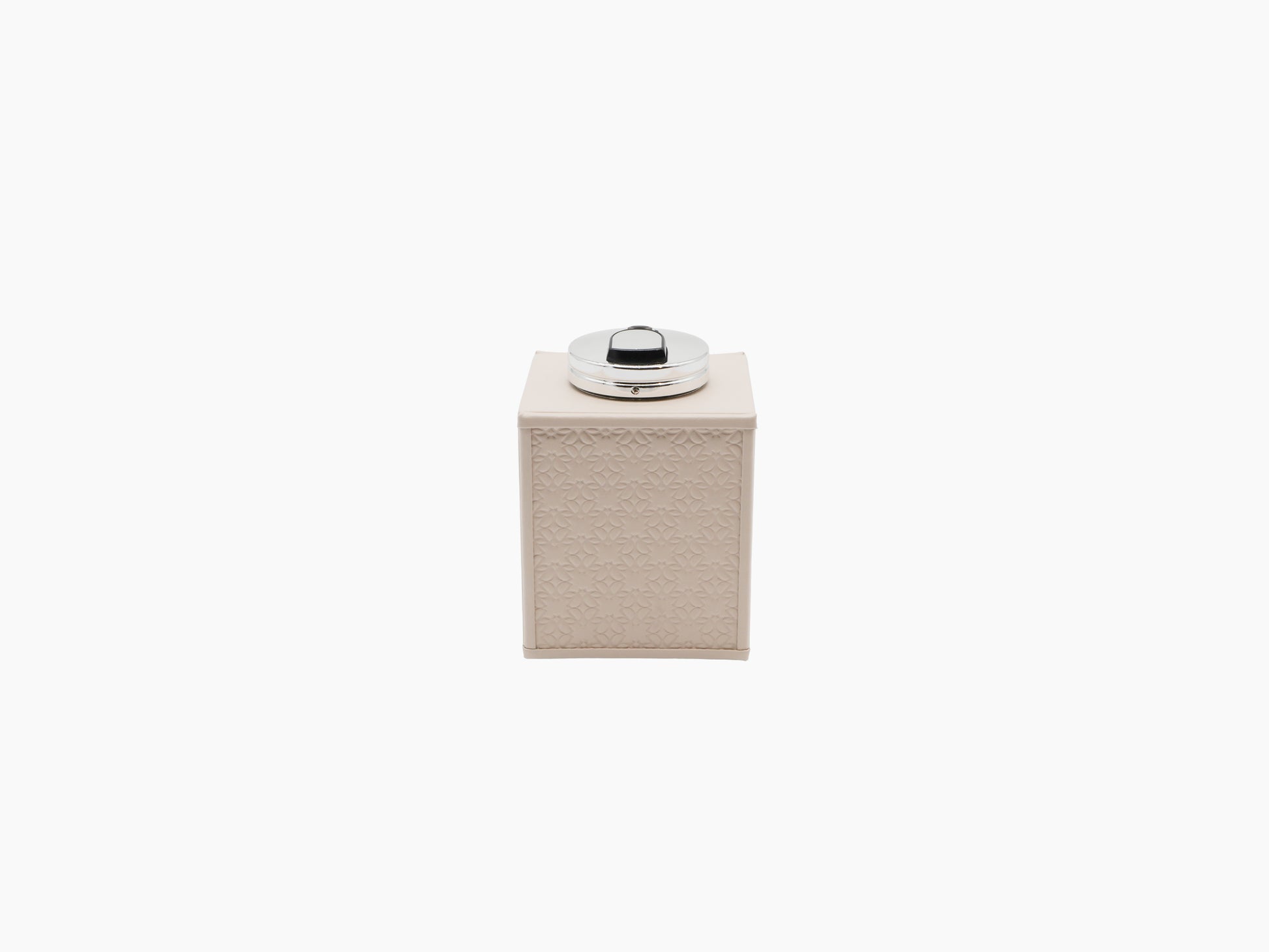 Monogram Table Lighter in cream padded leather with Elie Saab monogram and polished palladium top.