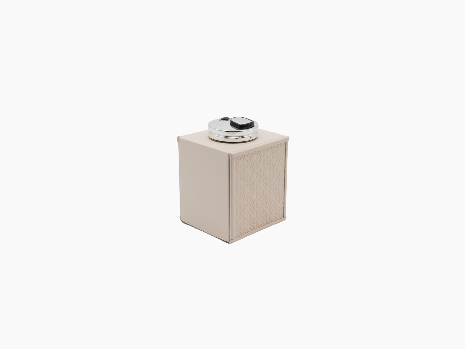 Beige padded leather ashtray and table lighter from the Monogram Table Set with palladium accents.