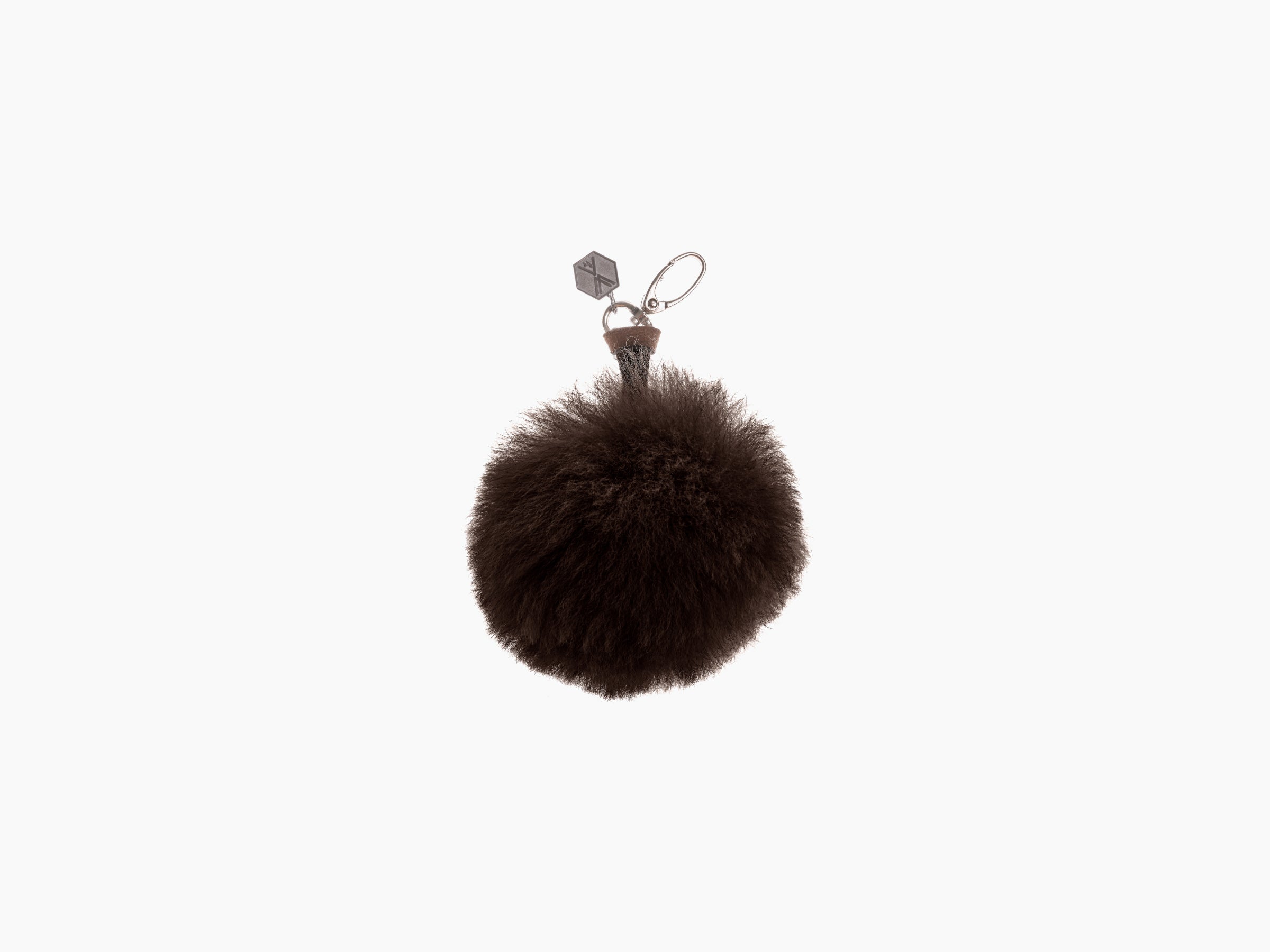 Dark brown fluffy Pompom CLAVE keychain with metal ring and hex charm.