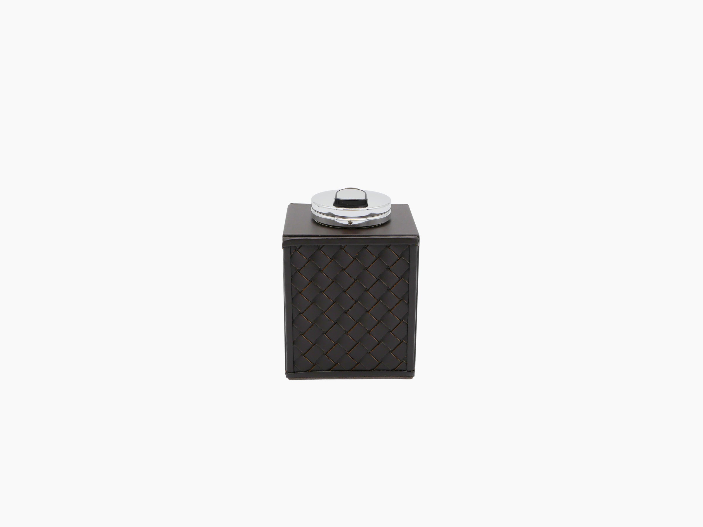 Nereo handwoven leather table lighter resting on a square dark brown woven leather box