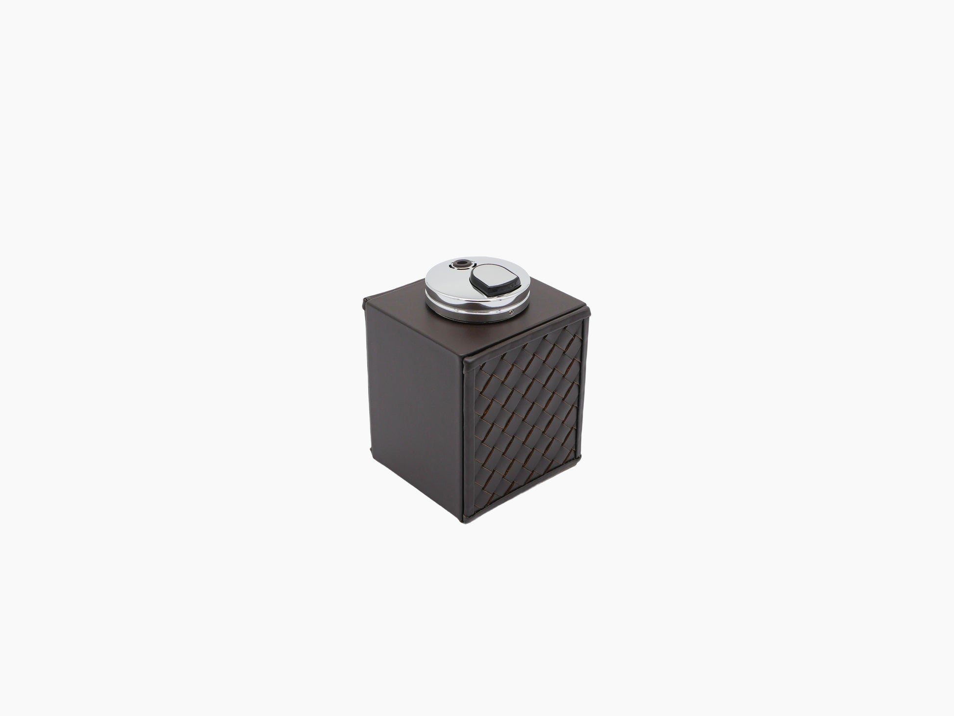 Nereo handwoven leather table lighter with a round chrome top on a dark brown leather cube