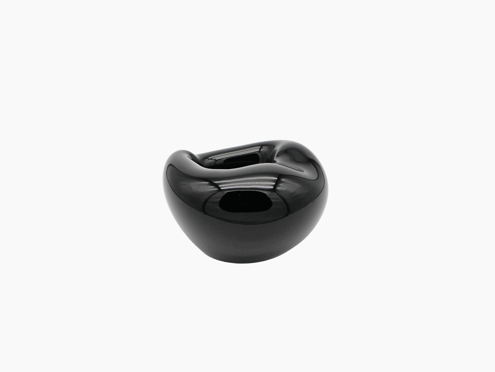 Small obsidian black hand blown glass vessel with a smooth glossy finish and a rounded body viewed head on.