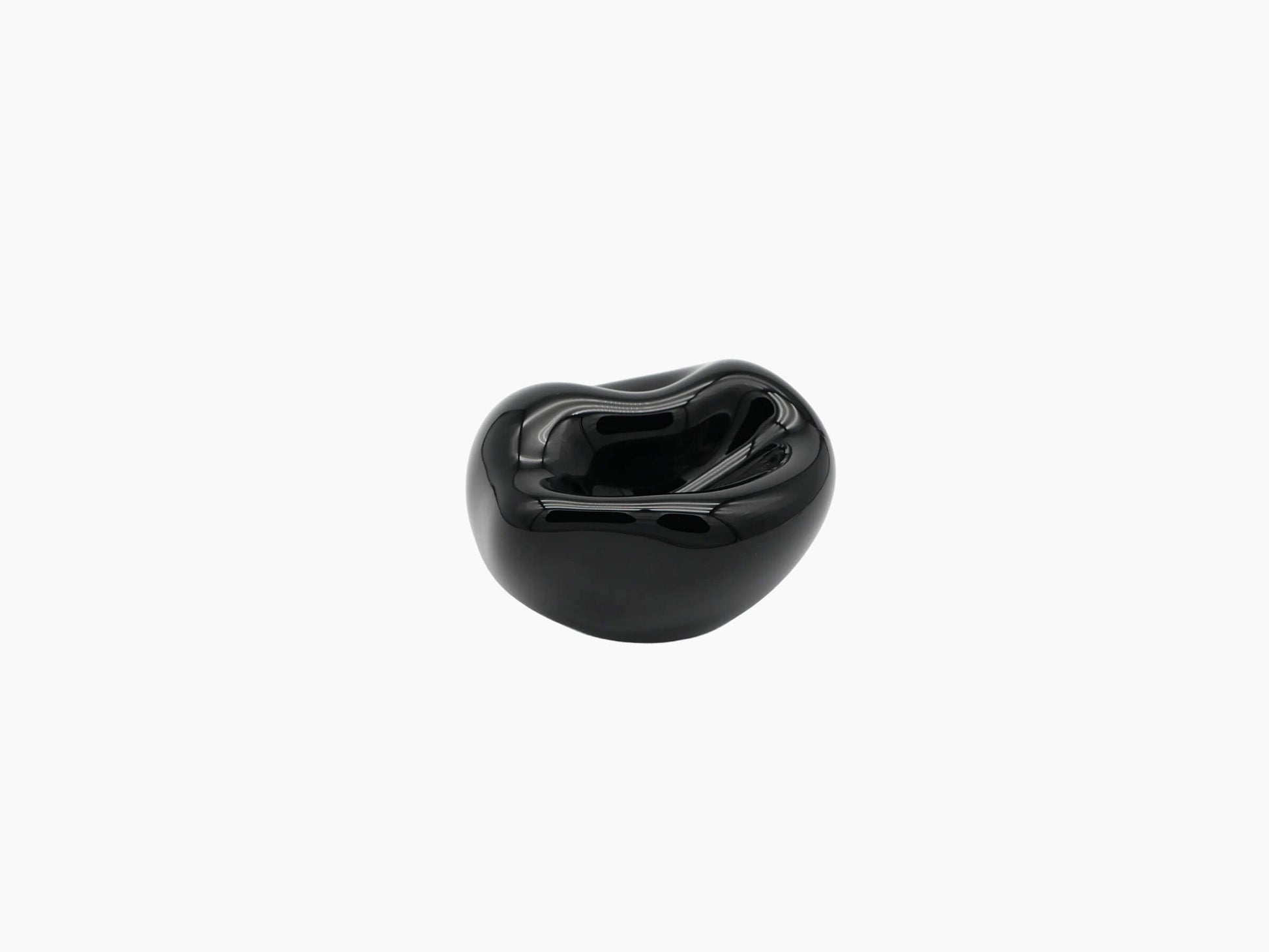 Vessel Small Obsidian Black with a rounded form and highly reflective glossy finish