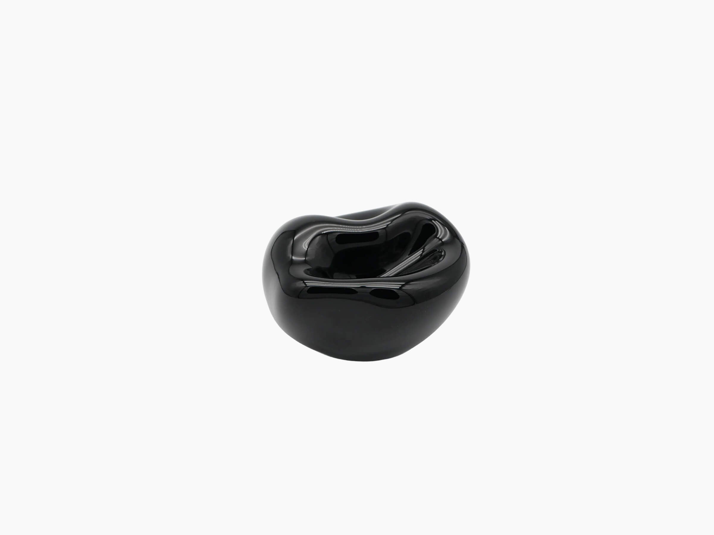 Vessel Small Obsidian Black with a rounded form and highly reflective glossy finish