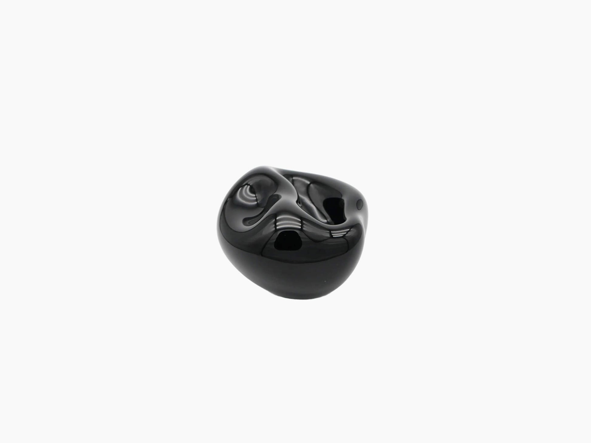 Vessel Small in obsidian black, a hand-blown glossy glass sculpture with abstract curves.
