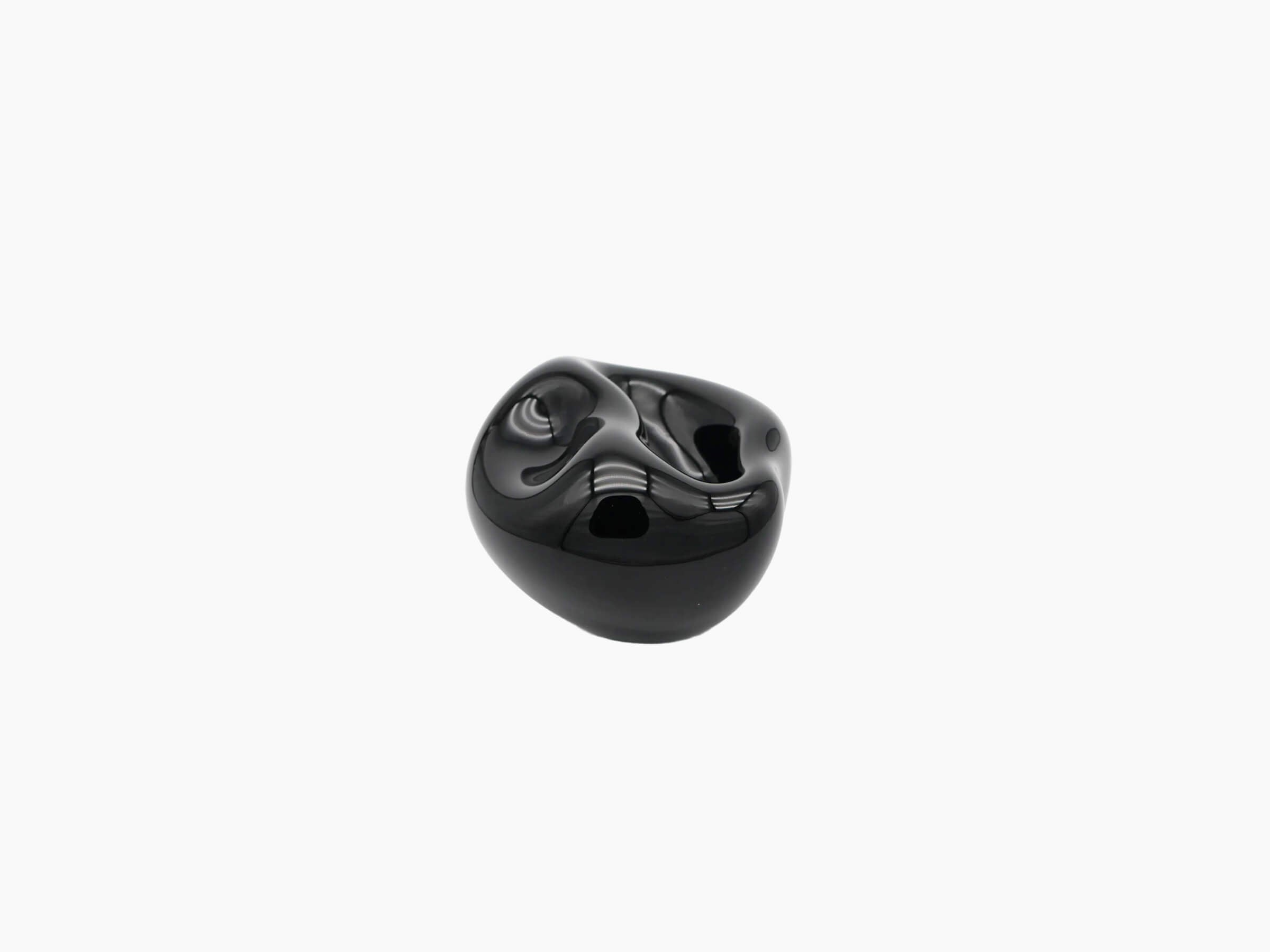 Vessel Small in obsidian black, a hand-blown glossy glass sculpture with abstract curves.
